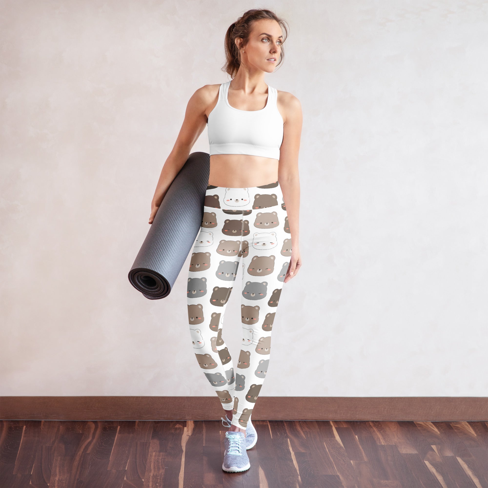 White buttery soft women’s yoga leggings with playful cartoon bear faces in brown gray and white shades