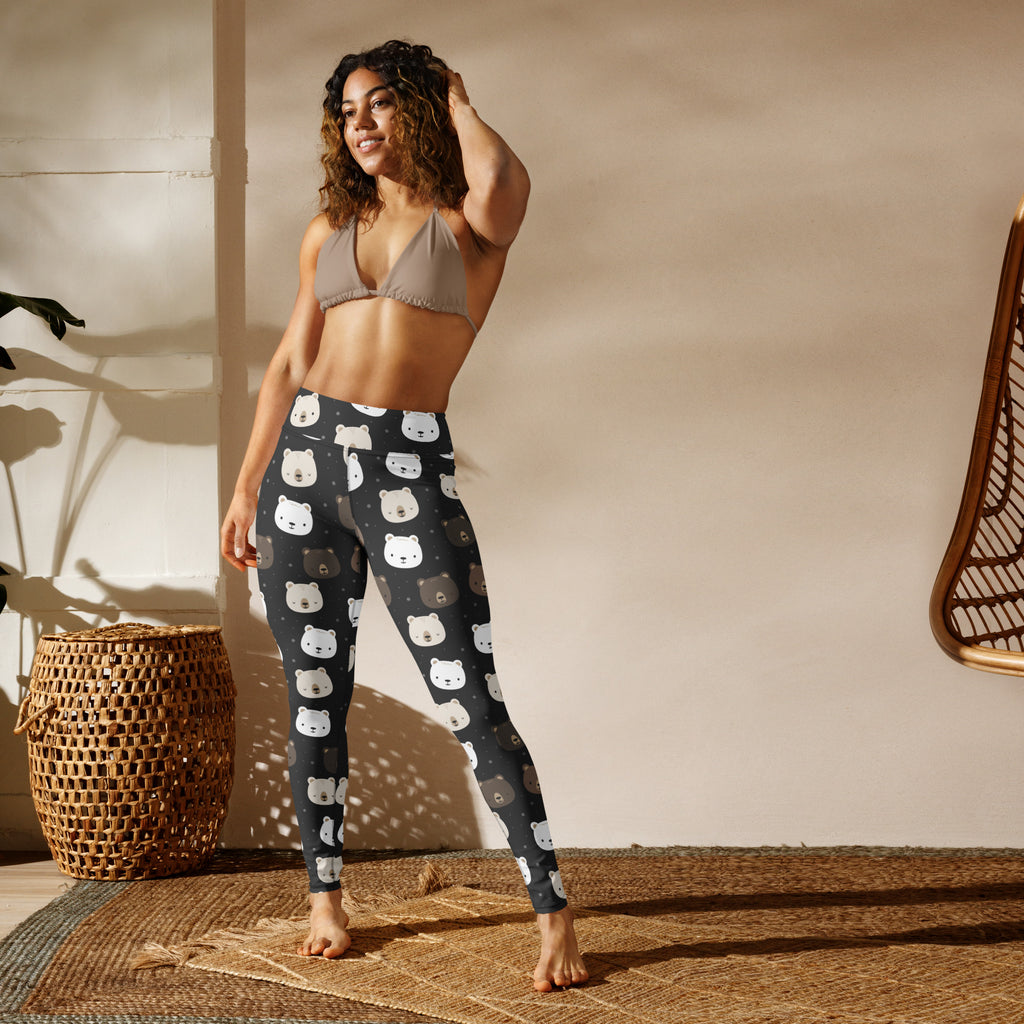 Women’s black buttery soft yoga leggings with playful white and brown bear face pattern