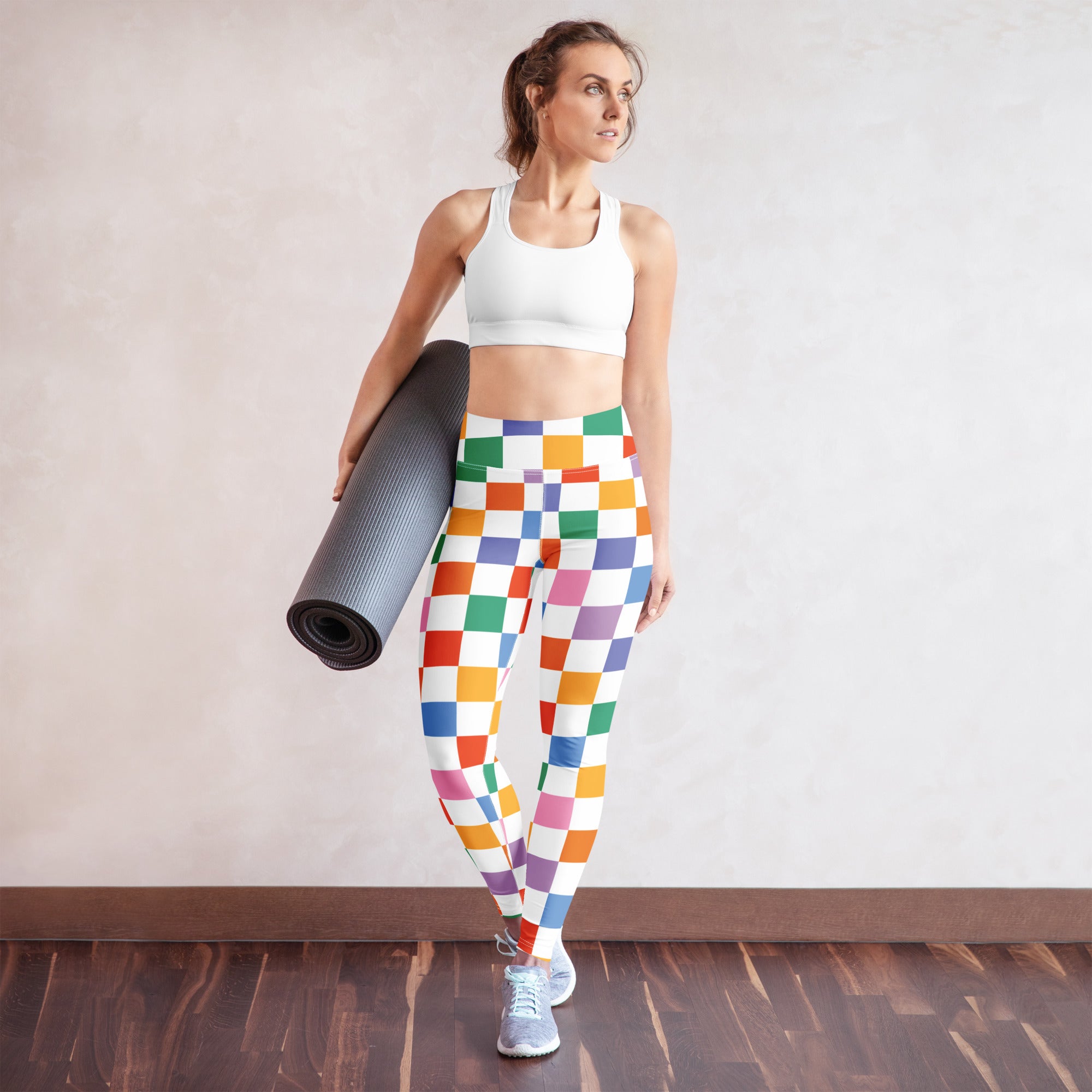 Women’s colorful checkered buttery soft high-waisted yoga leggings with a vibrant rainbow pattern