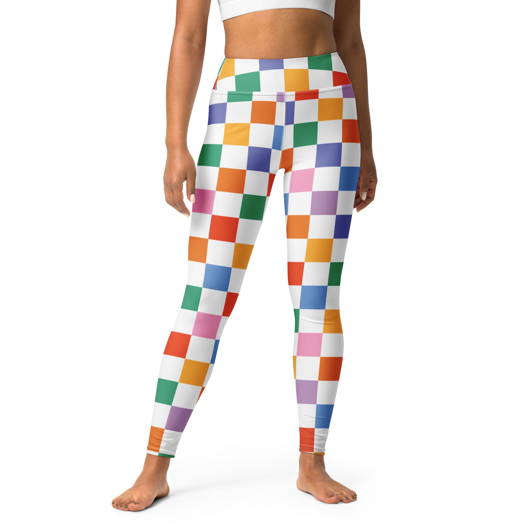 Women’s colorful checkered buttery soft yoga leggings with vibrant rainbow pattern on white background