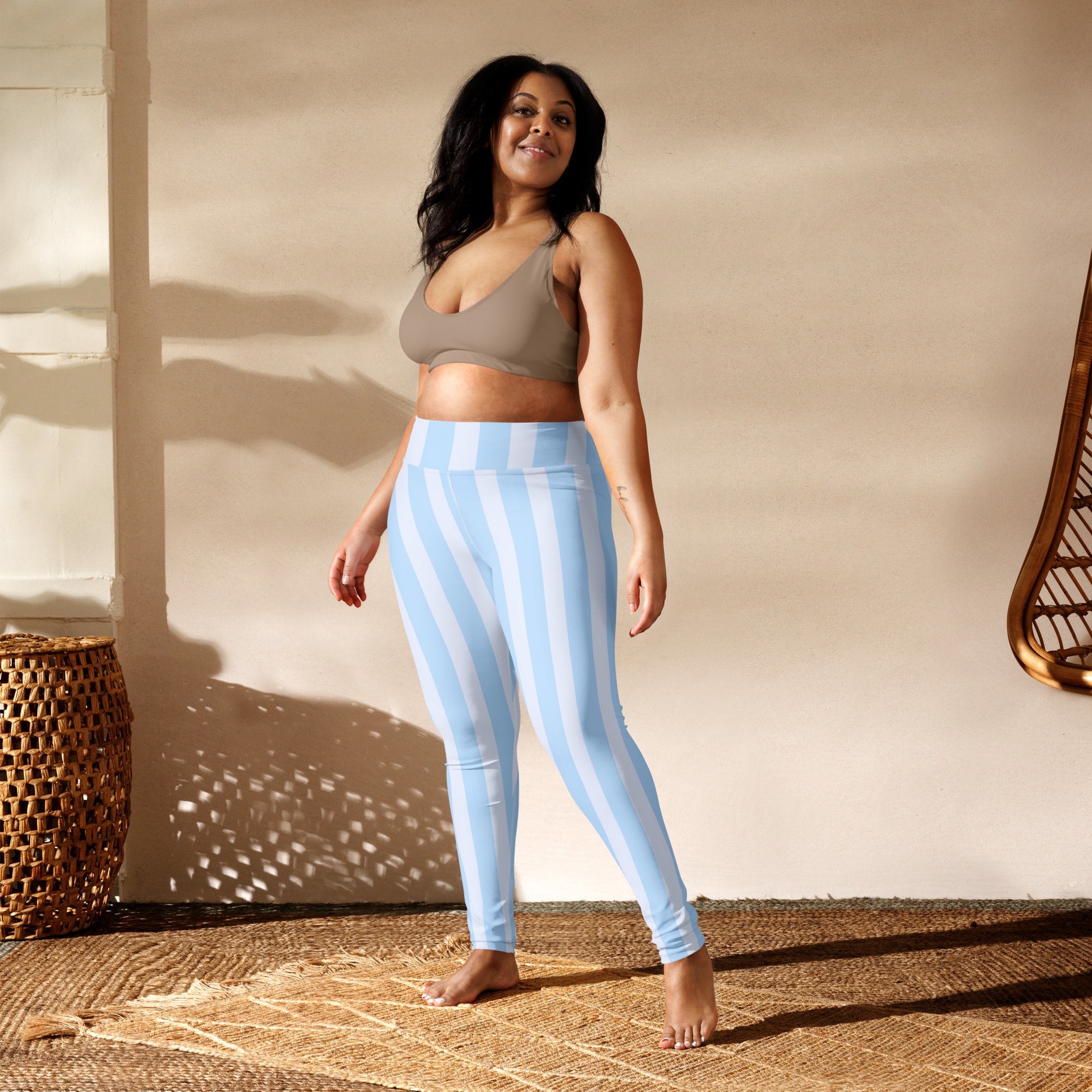 Women’s light blue and white striped buttery soft high-waisted yoga leggings shown from the front