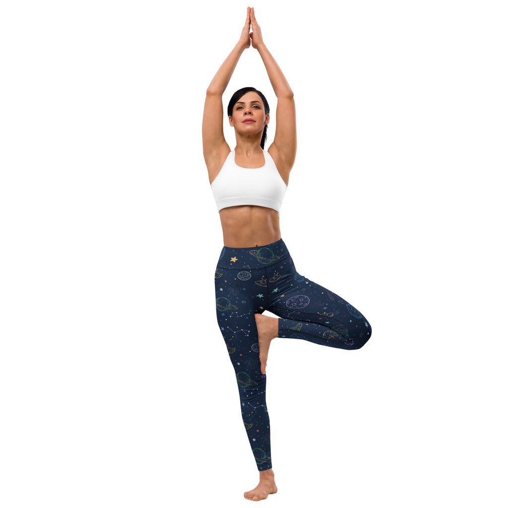 Women’s dark blue space-themed buttery soft yoga leggings with celestial patterns and high-waisted design