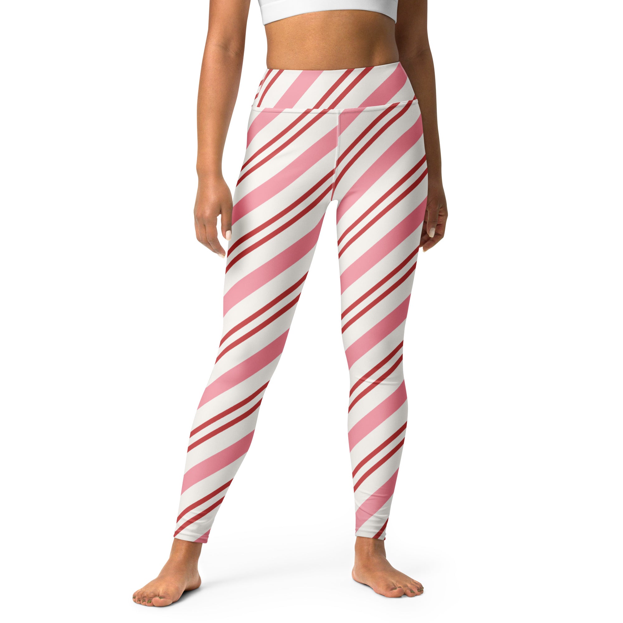 Women’s candy cane stripe buttery soft high-waisted yoga leggings with pink and white diagonal stripes
