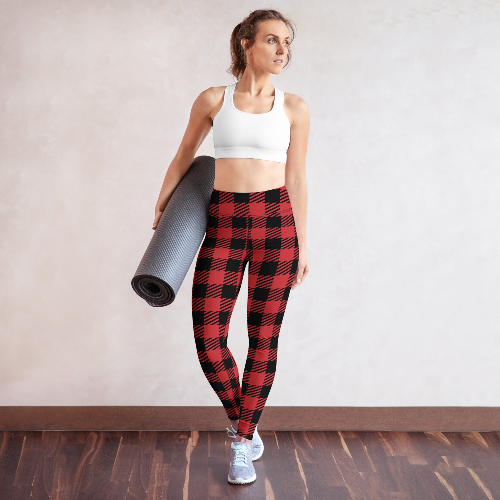 Women’s red buffalo plaid buttery soft yoga leggings in snug form-fitting design with red and black plaid pattern
