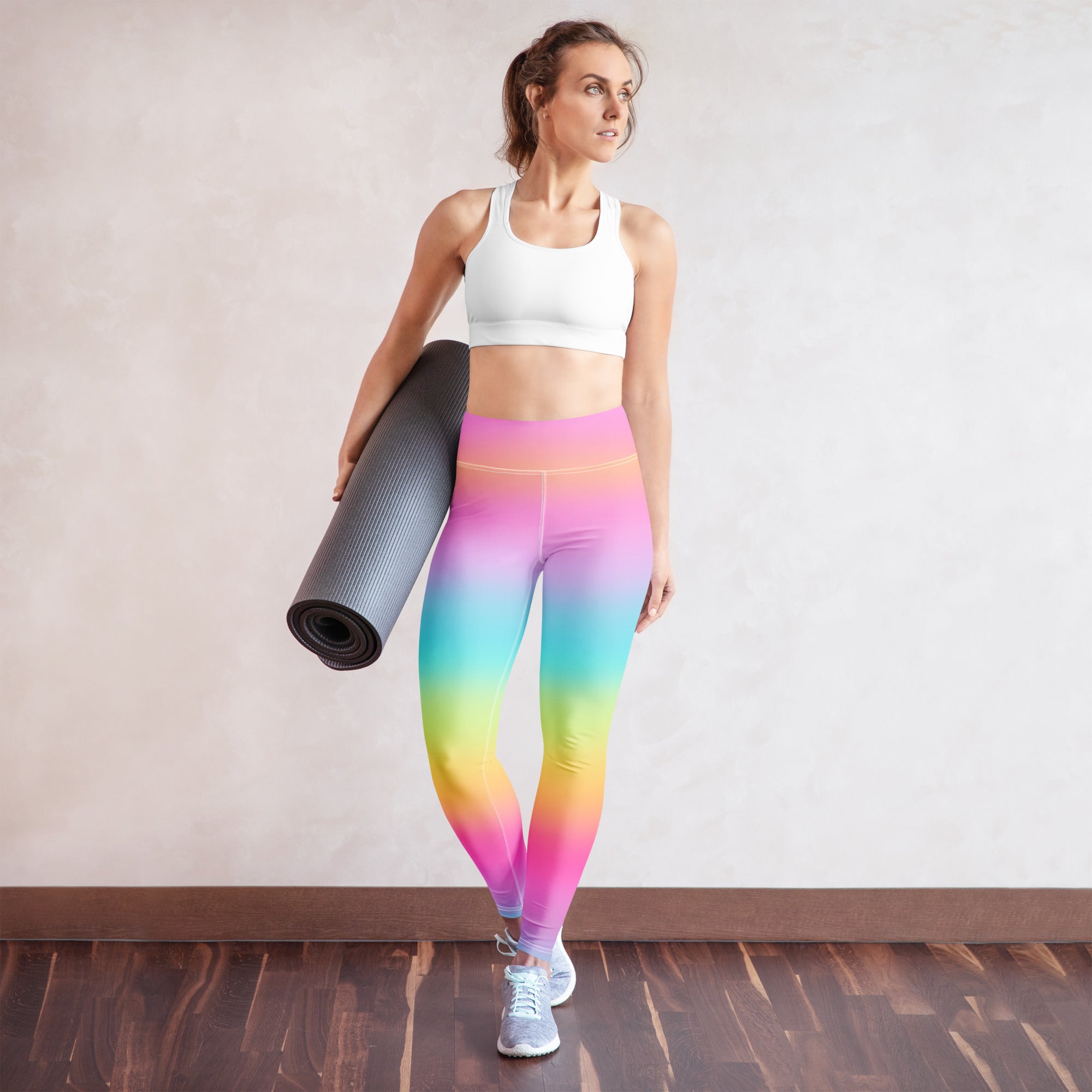 Women’s bright rainbow buttery soft yoga leggings with high-waisted design made from stretchy athletic fabric