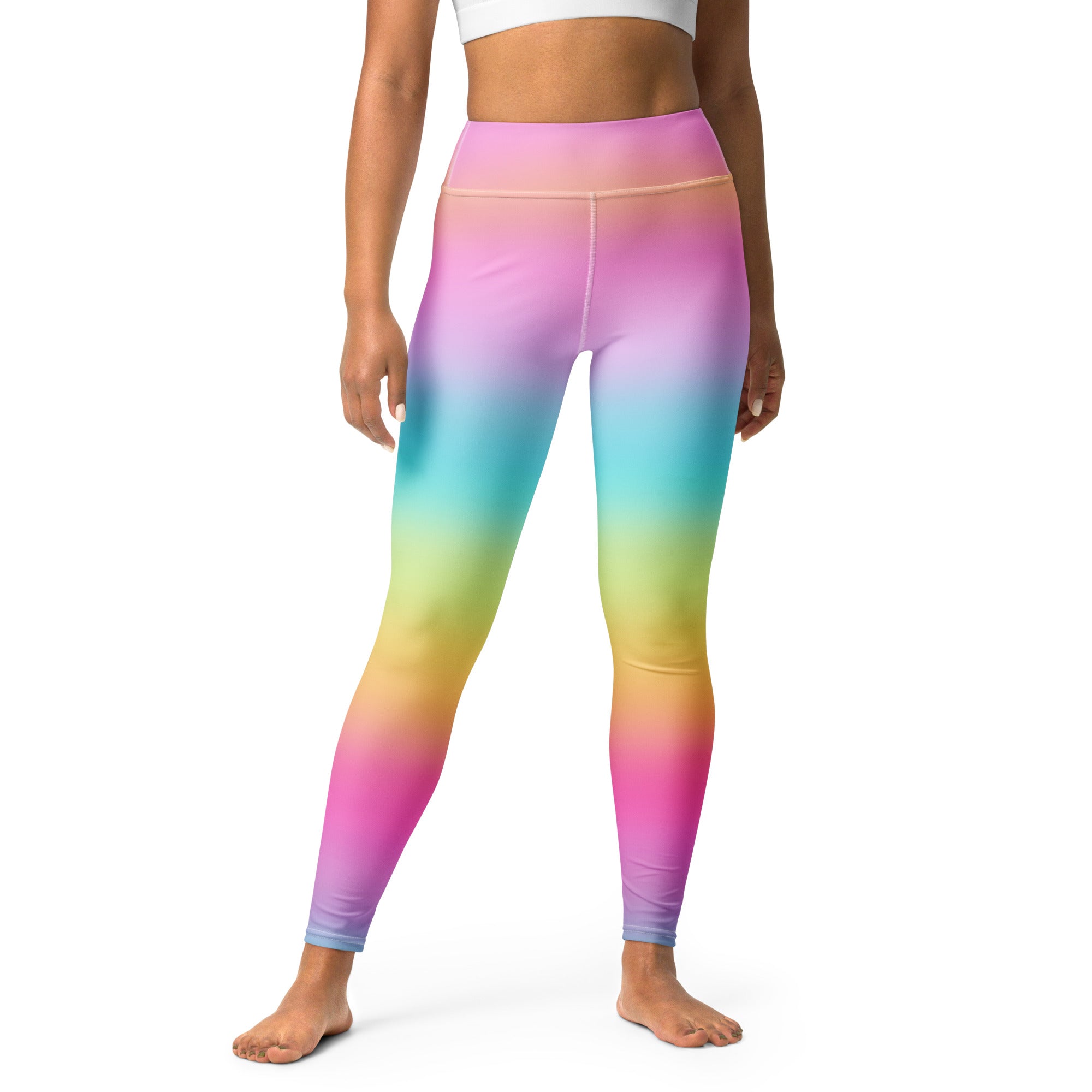 Women’s bright rainbow buttery soft yoga leggings in a rainbow gradient with smooth stretchy high-waisted fabric