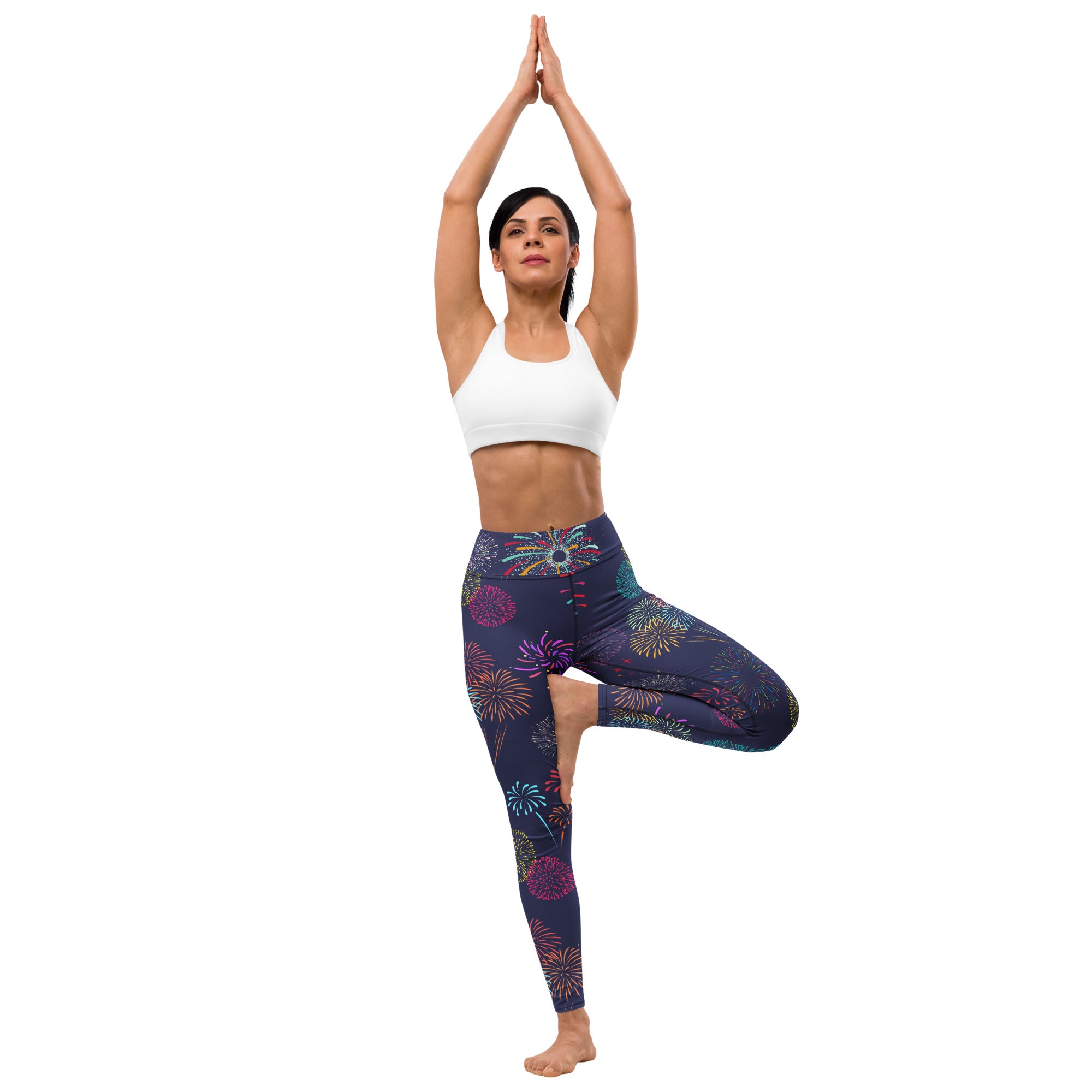 Dark blue womens buttery soft yoga leggings with a vibrant multicolored fireworks pattern