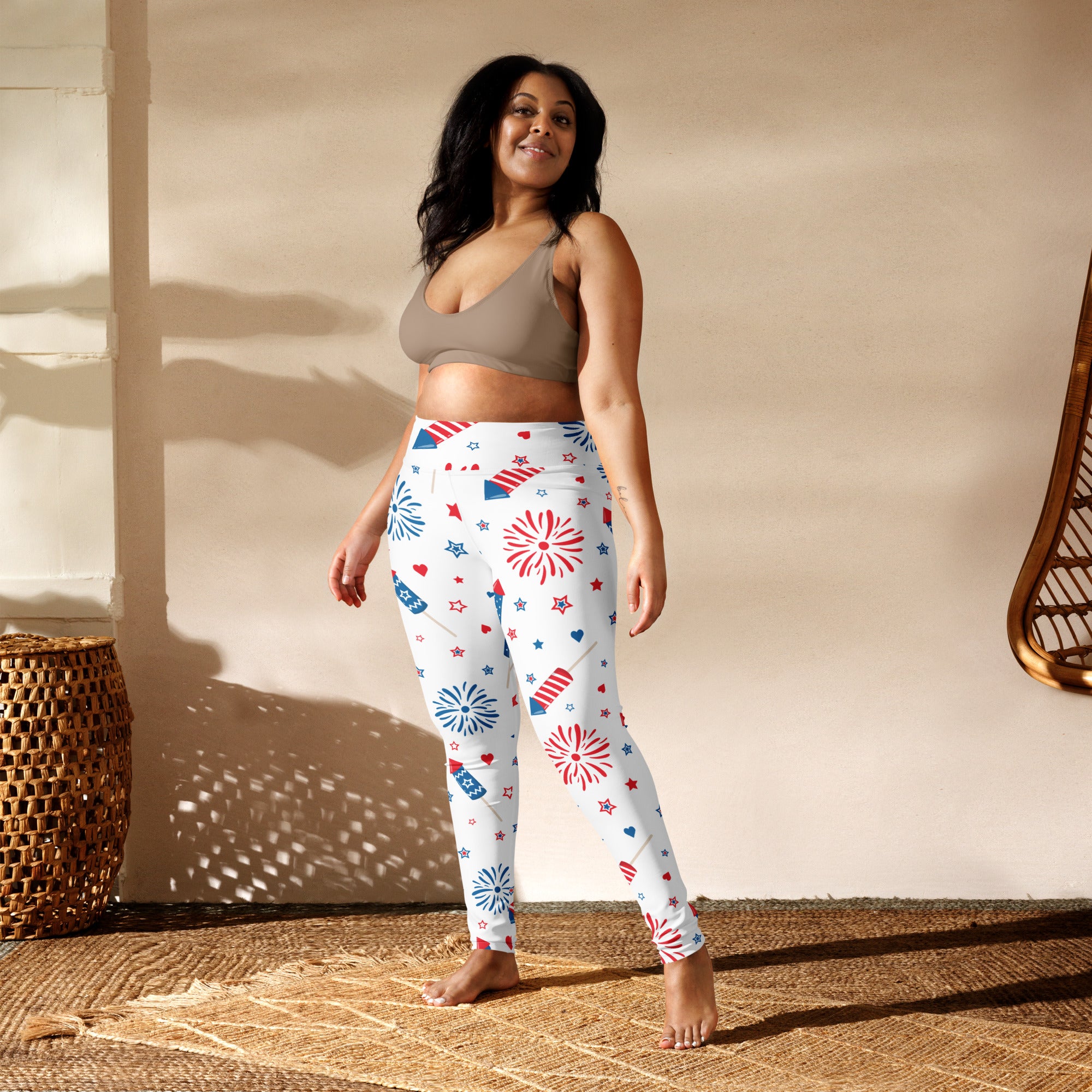 White buttery soft yoga leggings with vibrant red white and blue fireworks stars and sparklers pattern