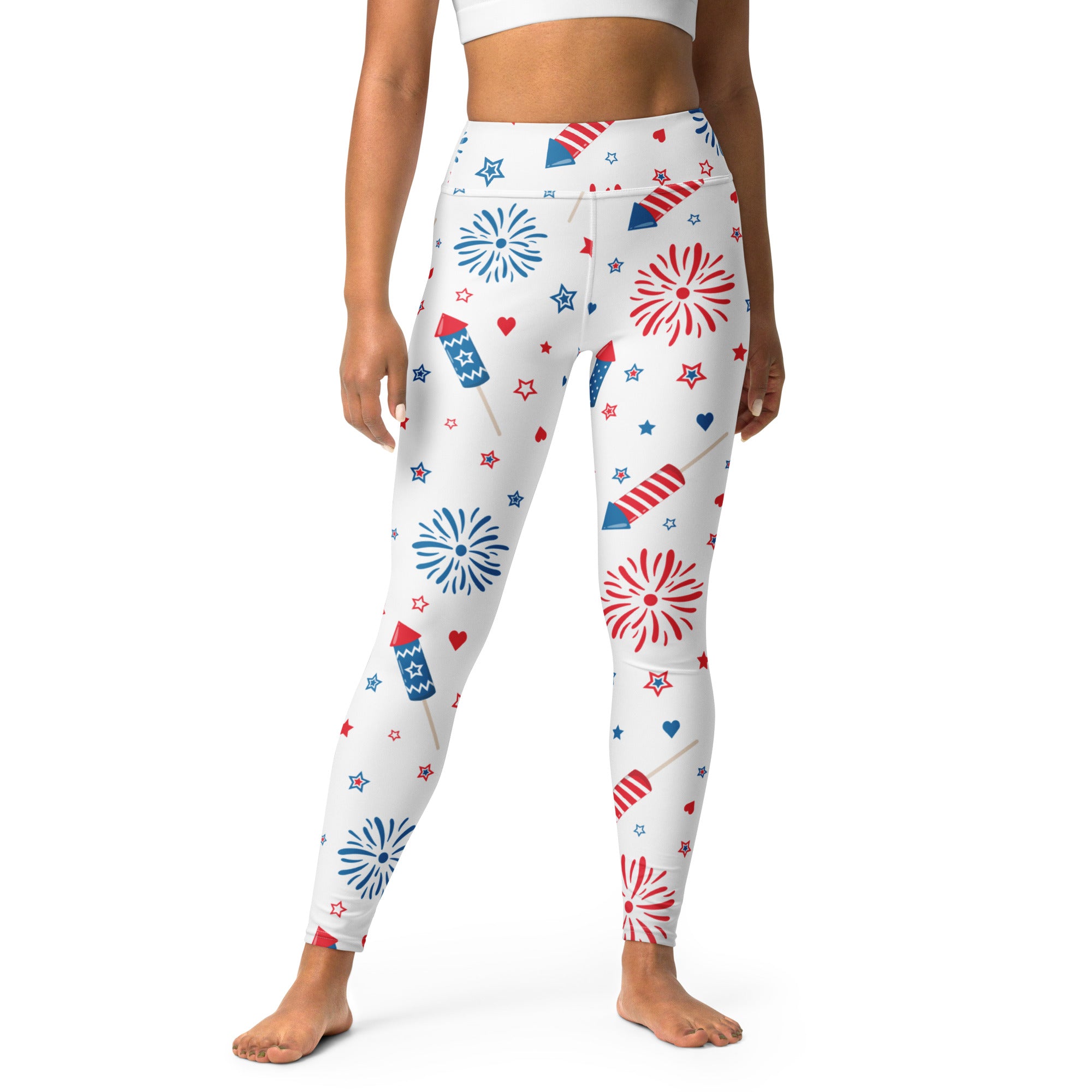 White high-waisted buttery soft yoga leggings with vibrant red and blue fireworks rockets stars and hearts pattern