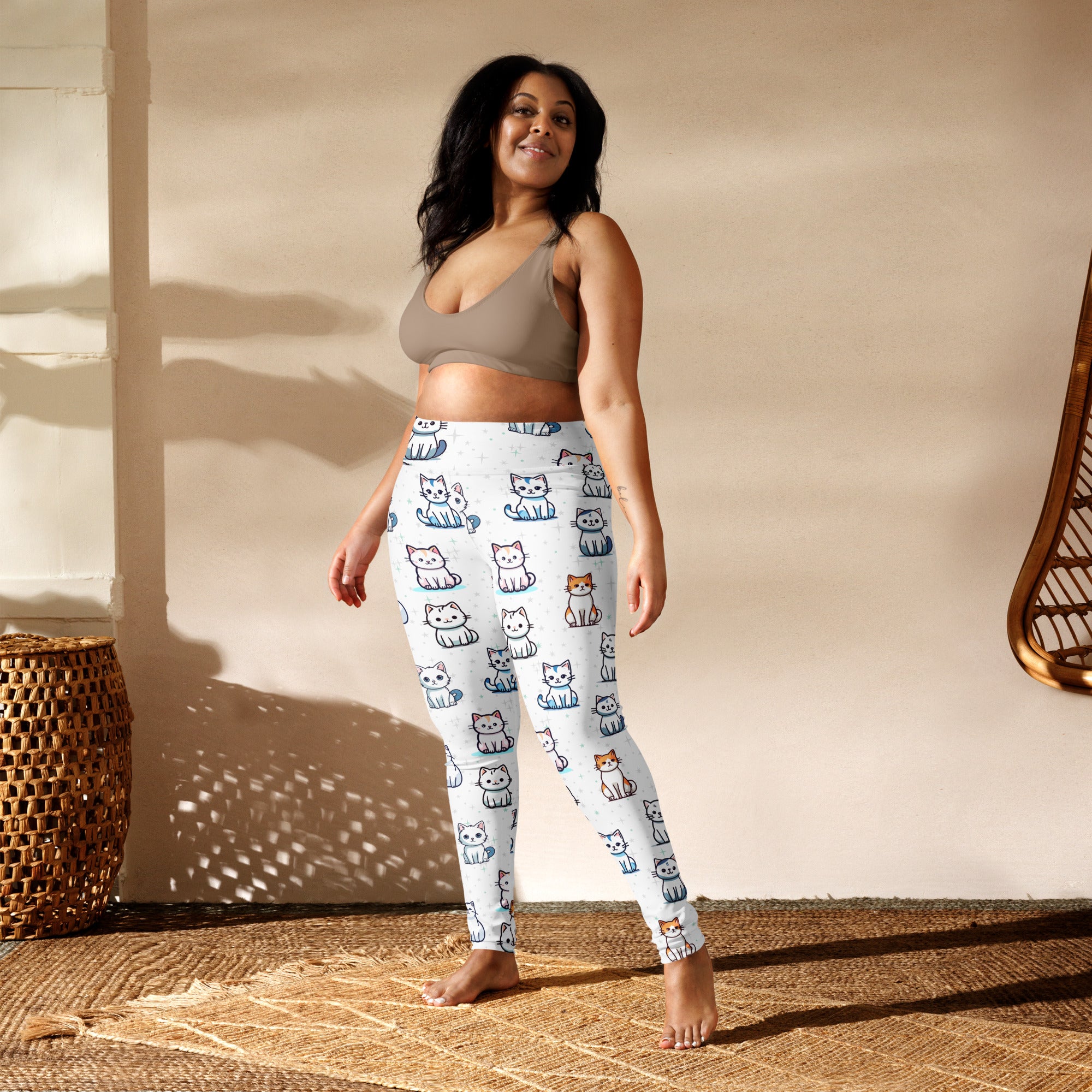 White women’s buttery soft yoga leggings with playful blue gray and orange cartoon cat pattern