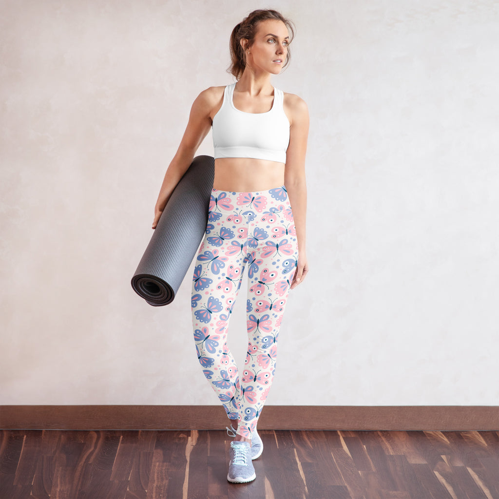 Women’s yoga leggings with pink and blue butterfly pattern made of buttery soft fabric for comfort and flexibility