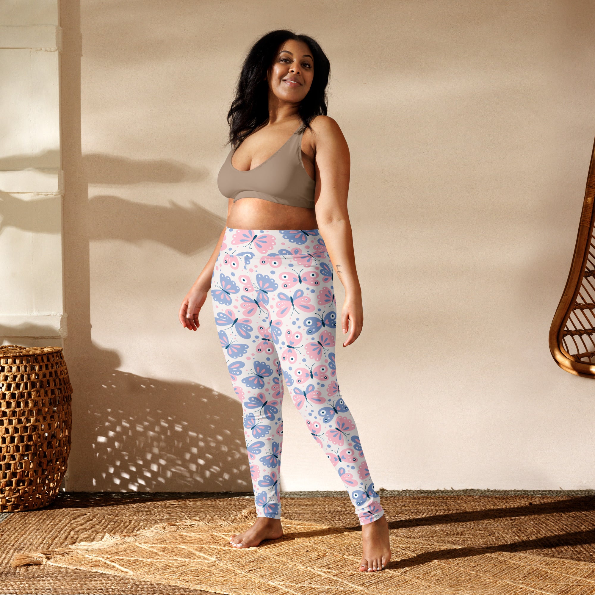 Women’s buttery soft yoga leggings with pink and blue butterfly pattern perfect for comfortable workouts