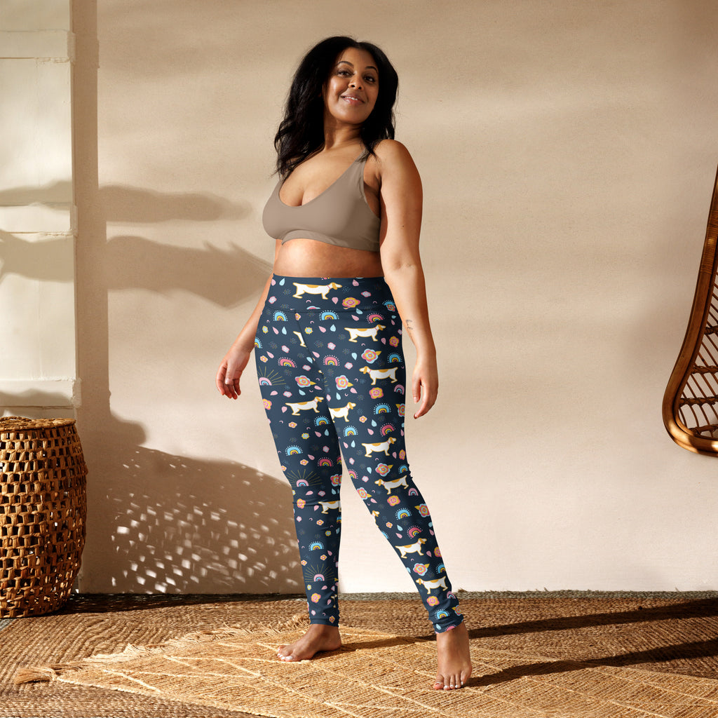 Navy blue buttery soft women’s yoga leggings featuring a playful pattern of white dachshunds rainbows and flowers