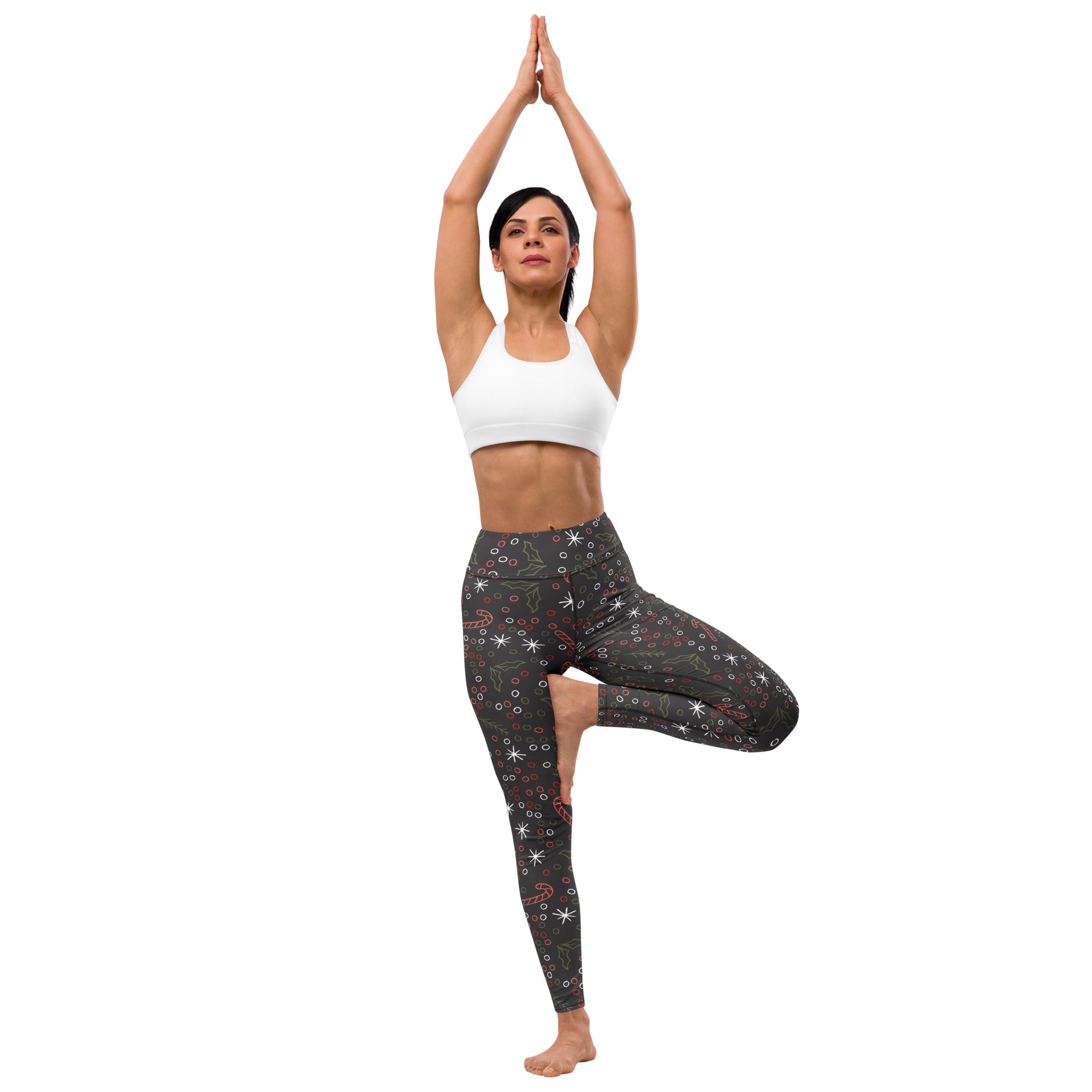 Women’s dark gray buttery soft yoga leggings with festive red and white stars candy canes and snowflakes pattern