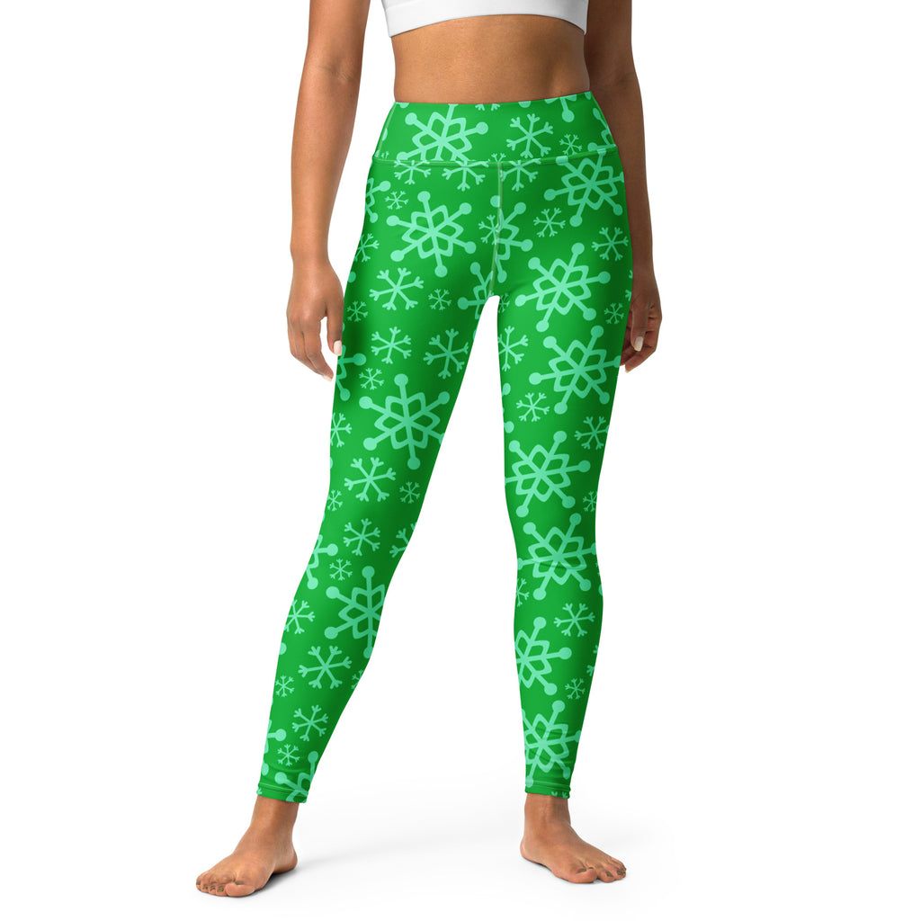 Women’s green snowflake high-waisted buttery soft yoga leggings featuring a festive winter pattern
