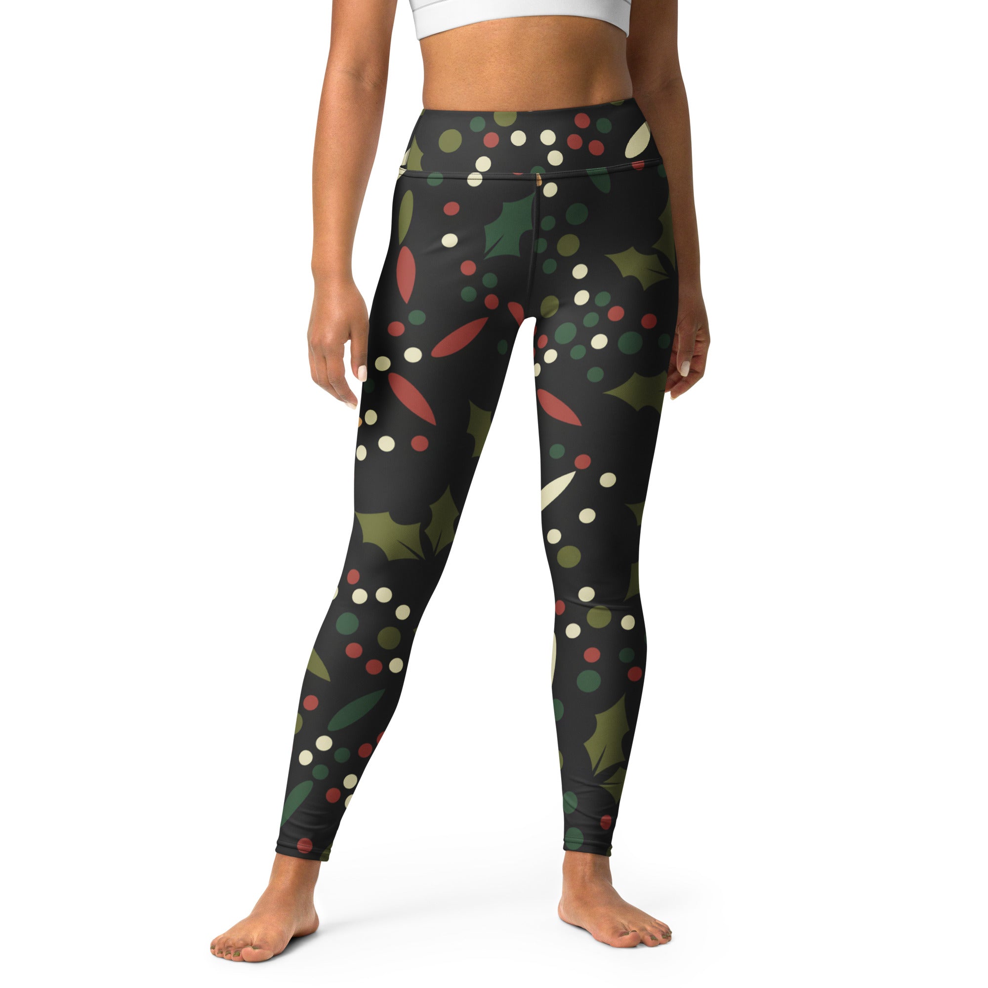 Black high-waisted buttery soft yoga leggings with green holly leaves red berries and colorful polka dot pattern