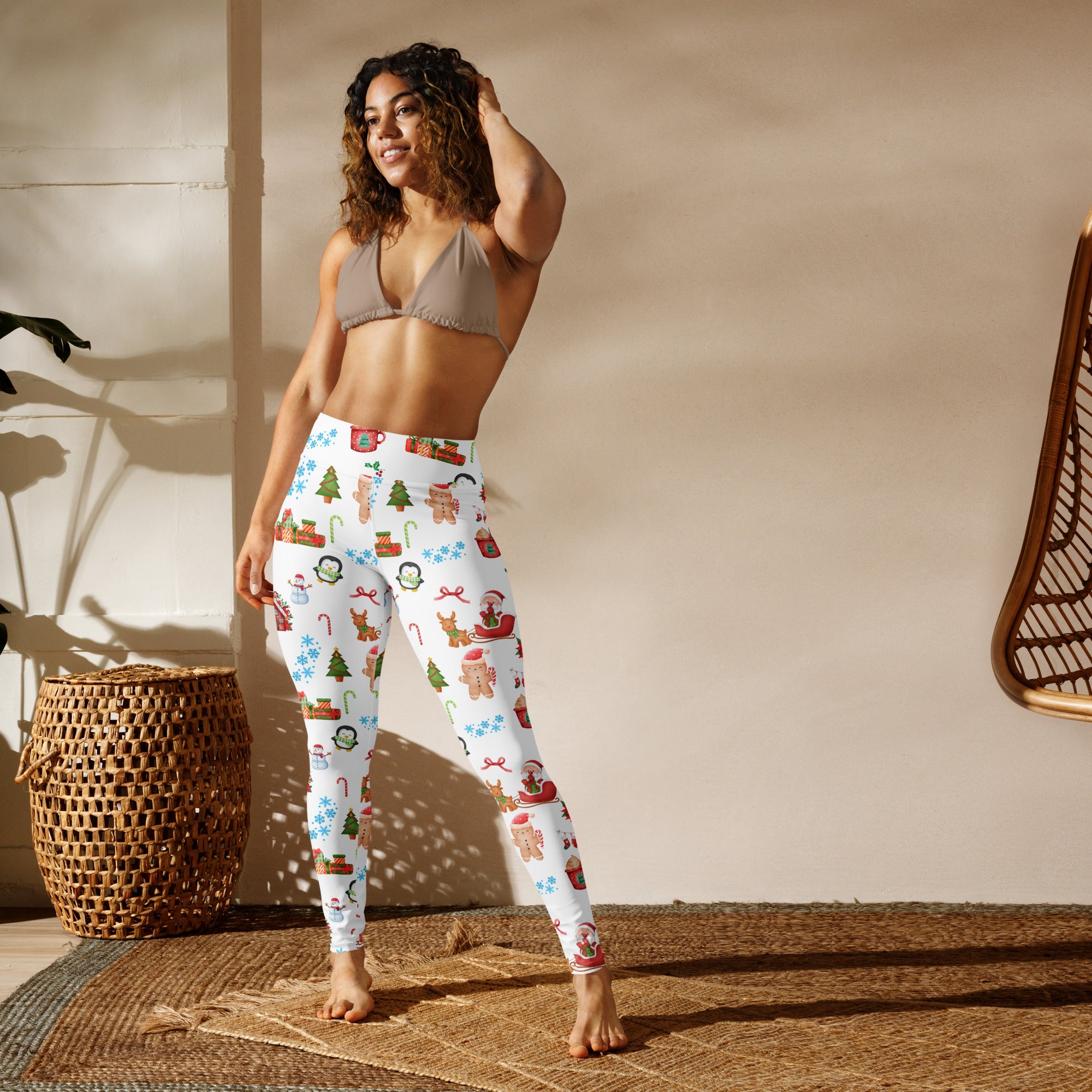 Women’s white christmas buttery soft yoga leggings with festive gingerbread men snowmen trees and candy canes patterns