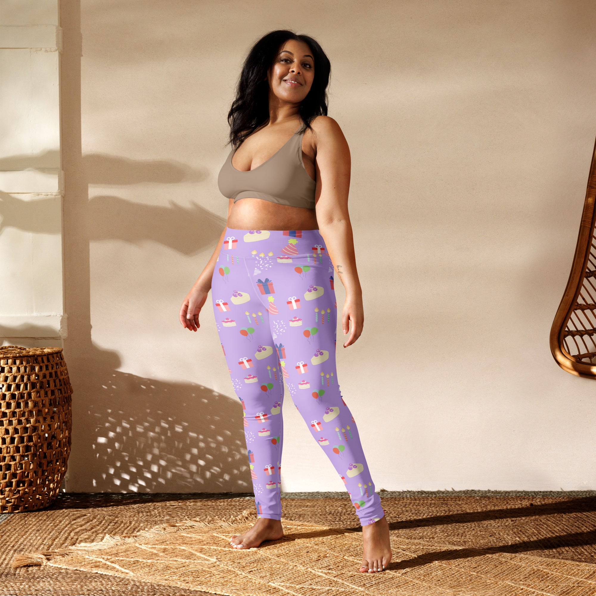 Women’s purple birthday pattern buttery soft yoga leggings with lavender color and playful cupcake gift and candy design
