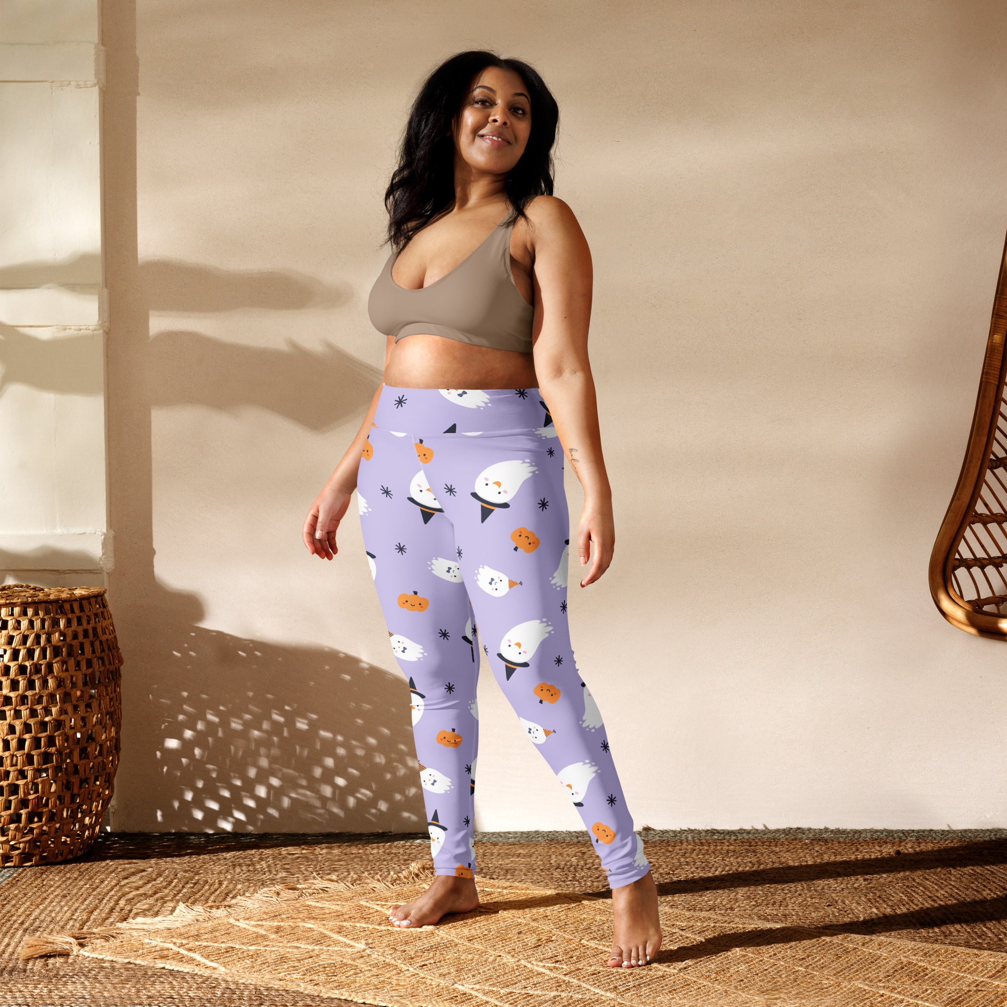 Women’s witch ghost buttery soft yoga leggings in lavender with white ghosts and orange pumpkins pattern