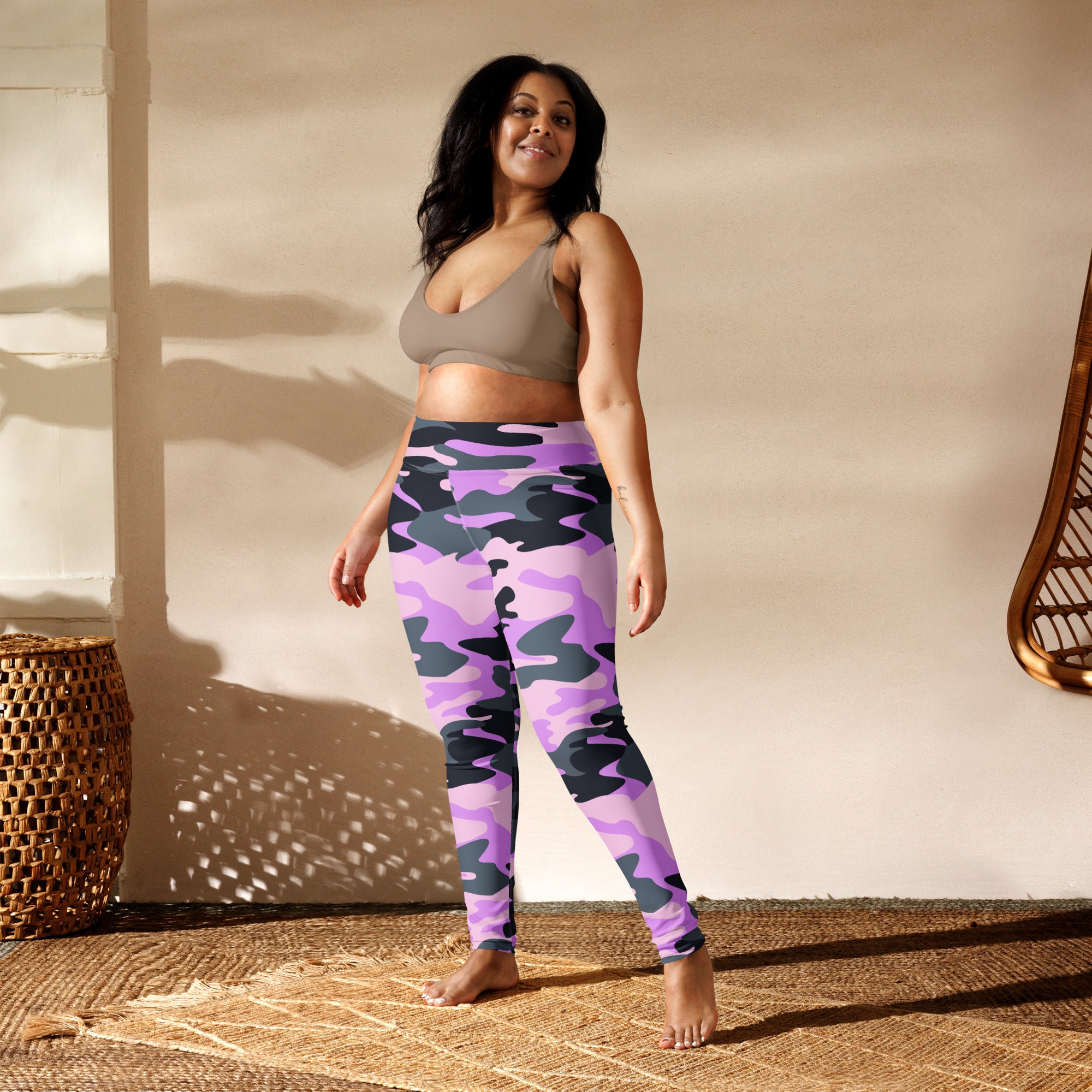 Women’s purple and black camouflage buttery soft yoga leggings shown from the back side