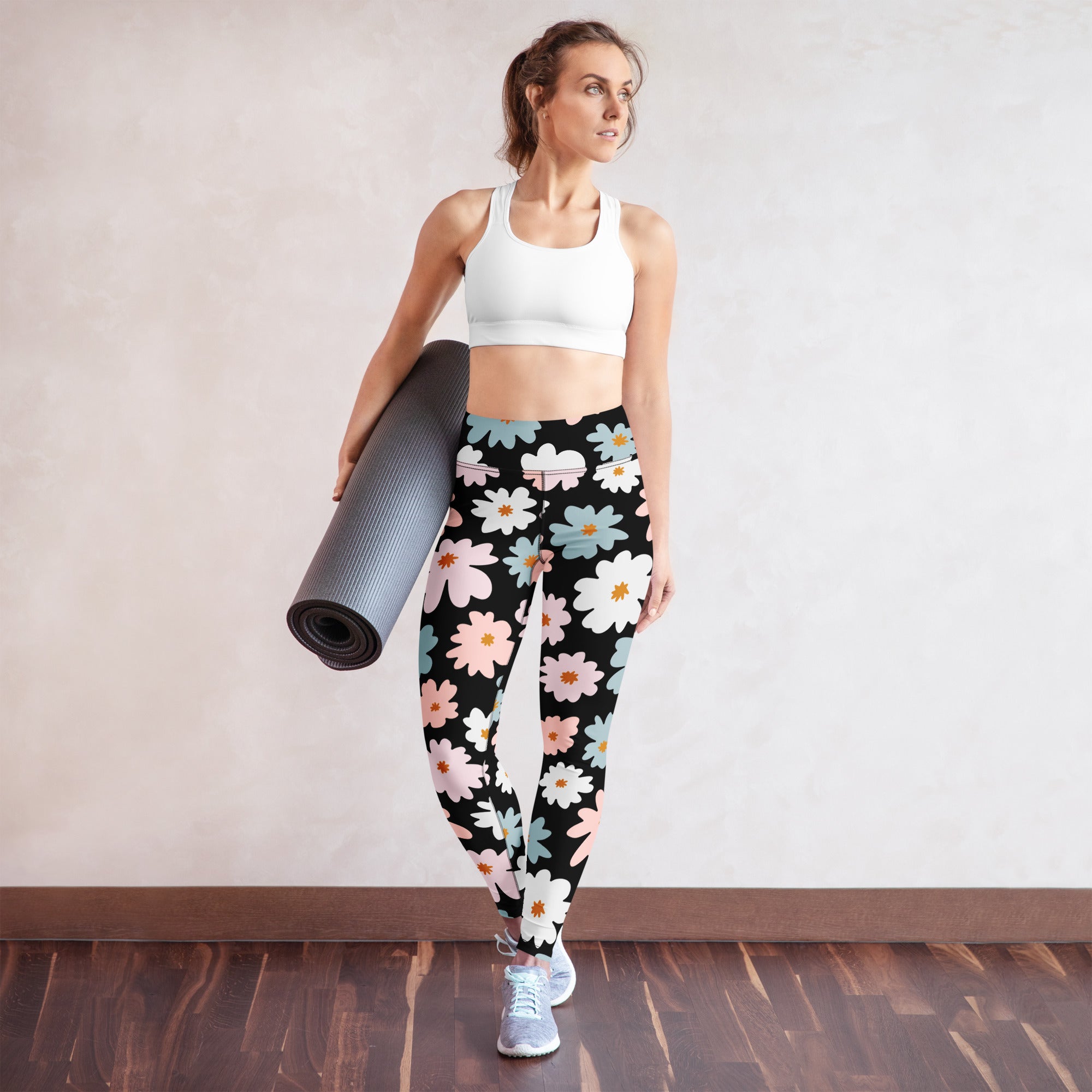 Women’s retro floral buttery soft yoga leggings in black with vibrant pink white and light blue floral pattern