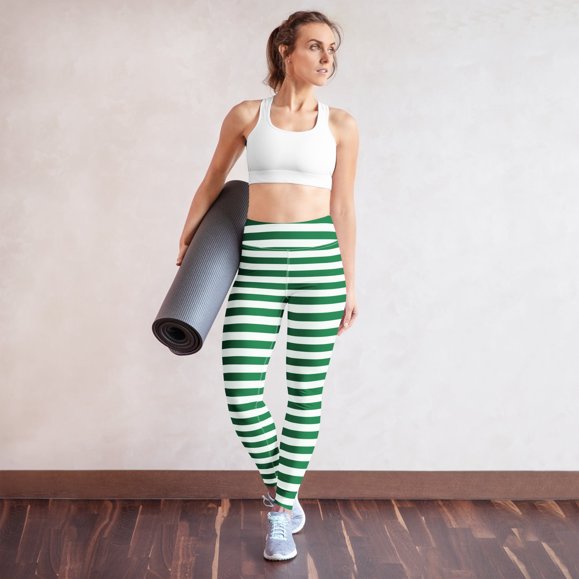 Women’s green and white striped buttery soft yoga leggings showcasing horizontal stripes and comfortable fit