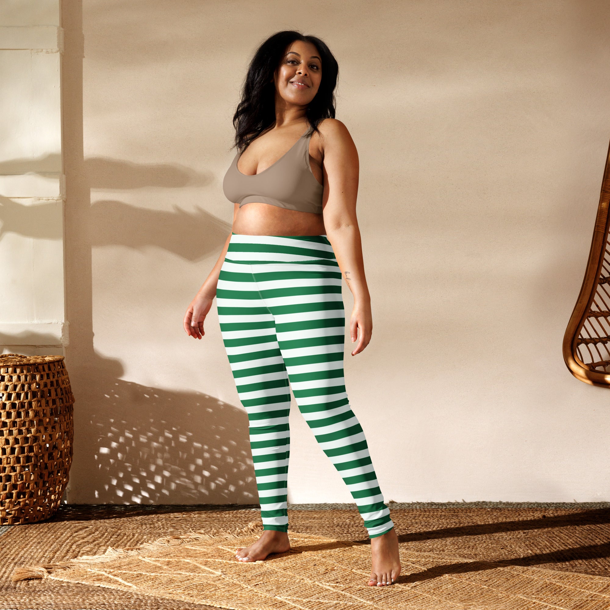 Women’s green and white striped buttery soft yoga leggings with horizontal stripes for comfortable activewear
