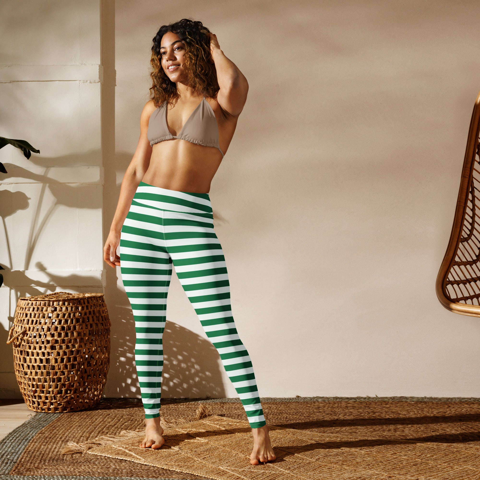 Women’s green and white striped buttery soft yoga leggings with horizontal stripes for comfortable workout wear