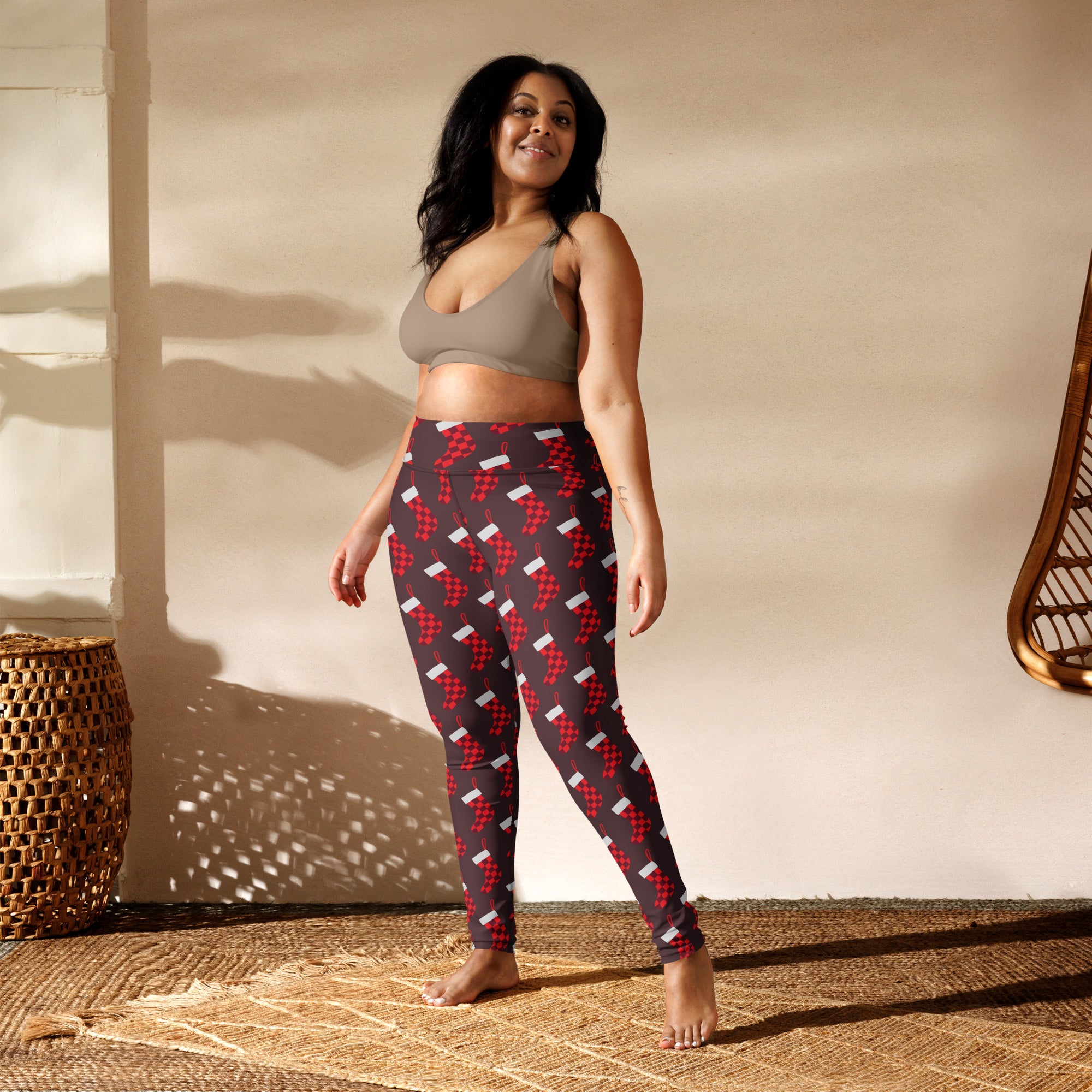 Women’s buttery soft yoga leggings with red and white checkered christmas stocking pattern for festive wear