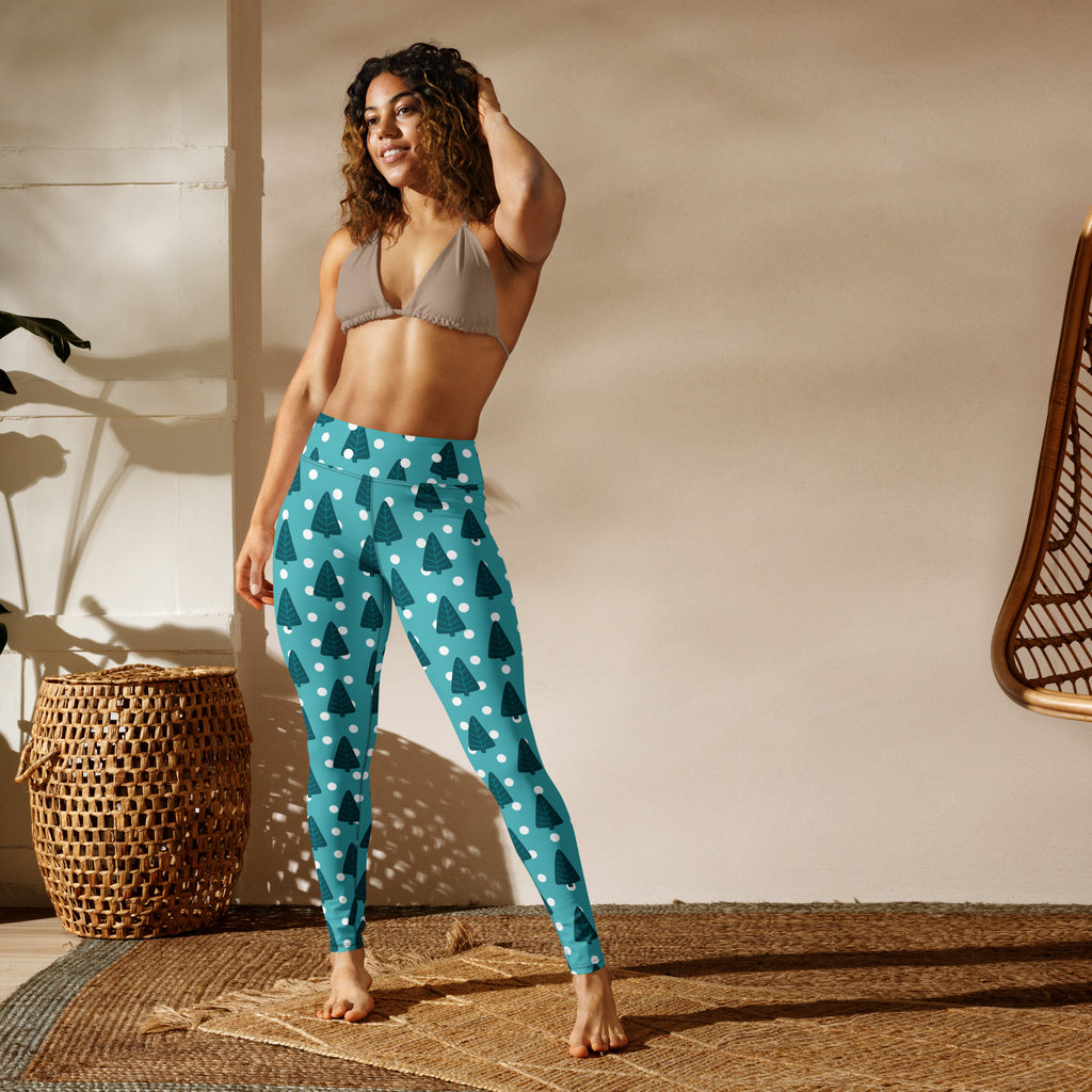 Women’s teal high-waisted buttery soft yoga leggings with dark teal pine trees and white polka dots pattern