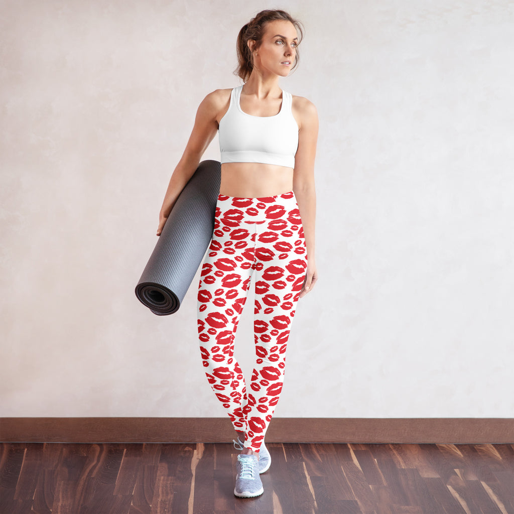 White high waisted buttery soft yoga leggings with vibrant red lipstick print and quick drying fabric