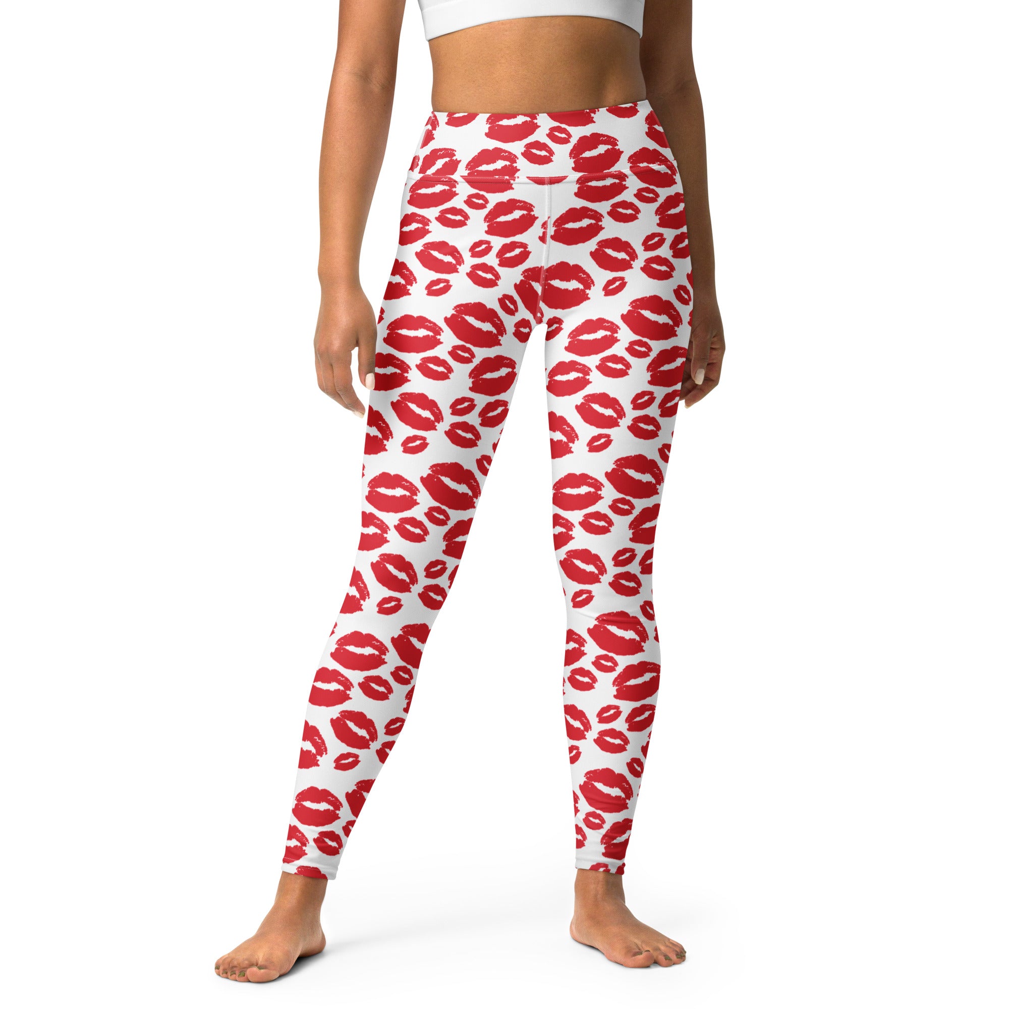 White buttery soft high waisted yoga leggings with vibrant red lipstick kiss print and quick drying fabric