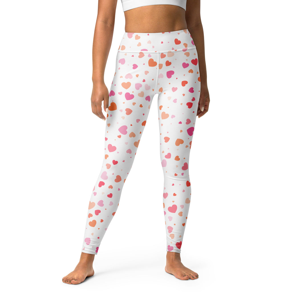 White buttery soft high waisted yoga leggings with quick drying fabric and pink peach coral heart pattern