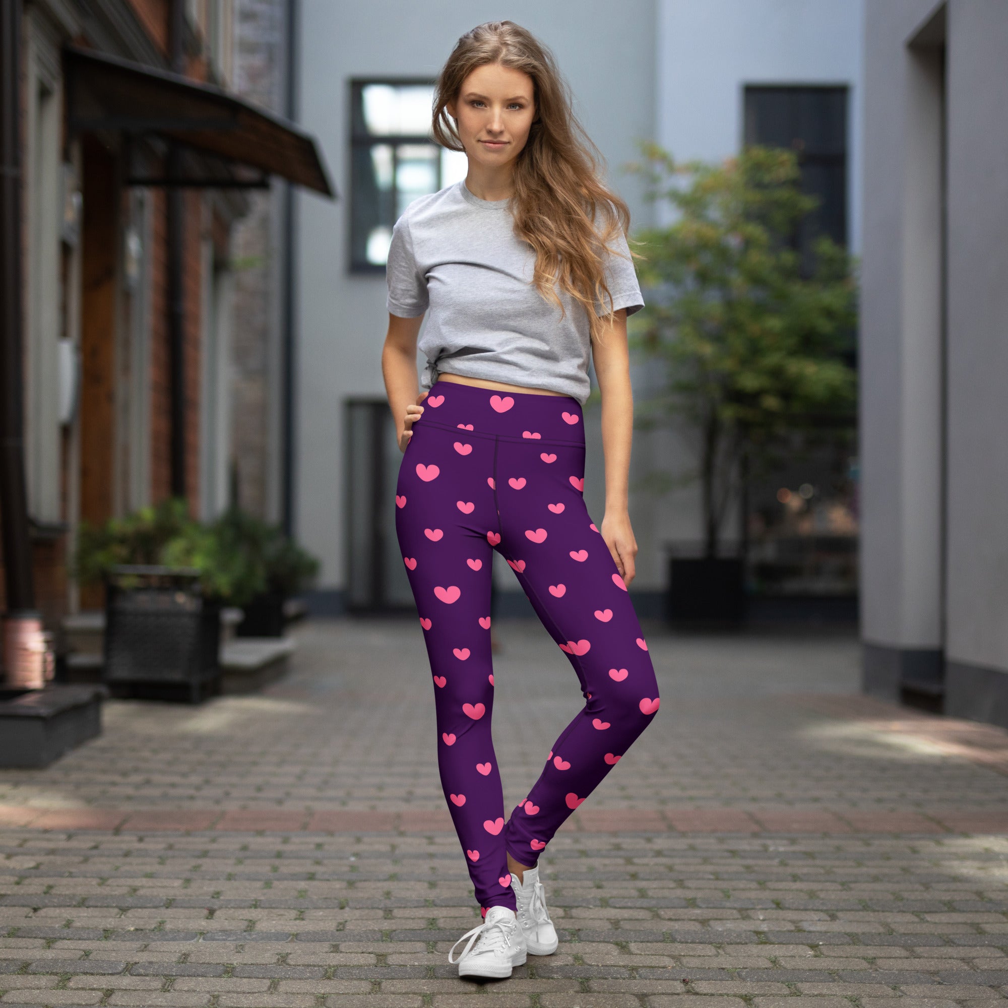 Women’s purple valentine buttery soft high waisted yoga leggings with pink heart patterns and quick drying fabric