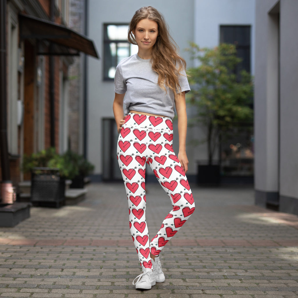 Women’s white arrow heart buttery soft yoga leggings with vibrant red hearts black outlines and crown details