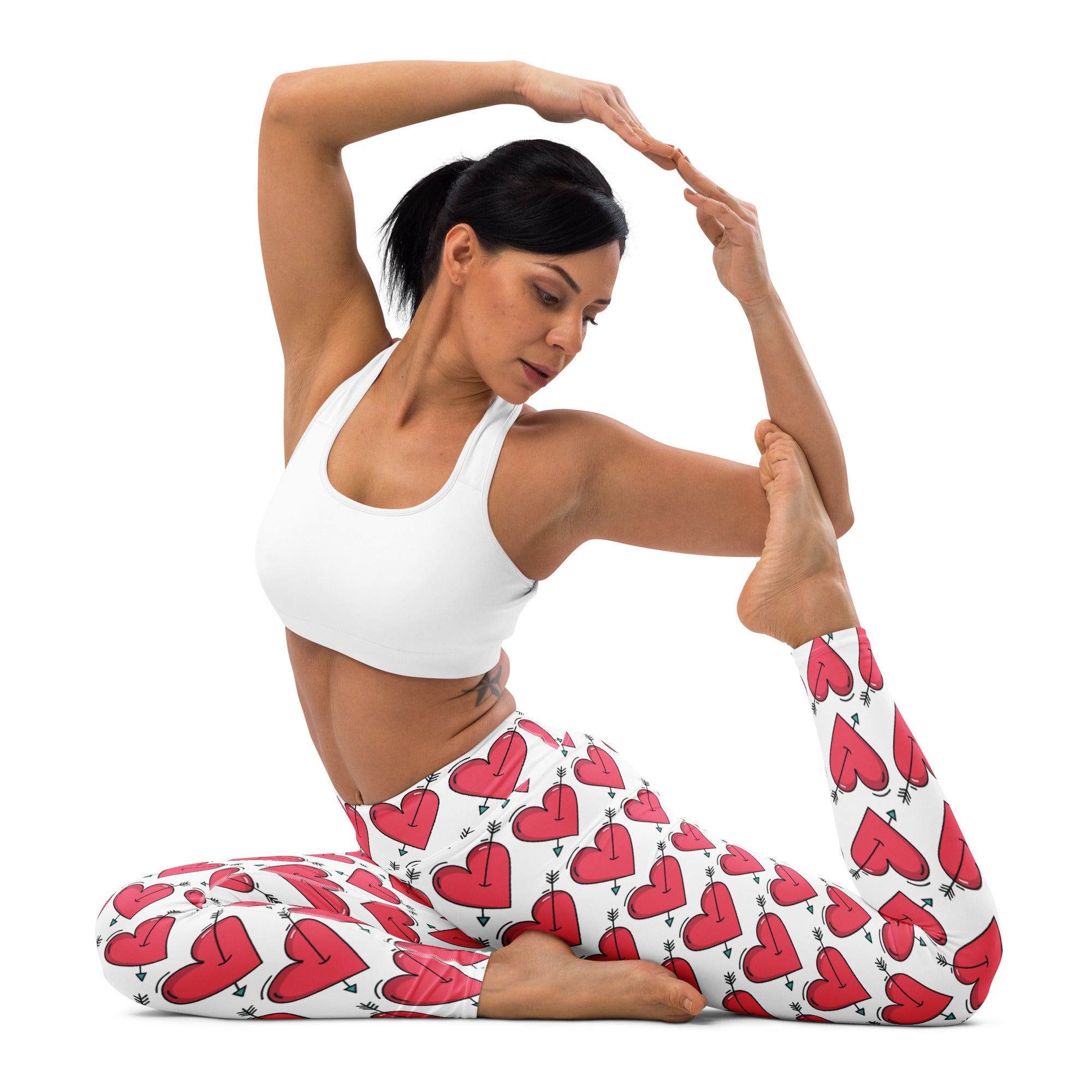 Women’s white buttery soft yoga leggings with high waist feature a vibrant red heart and black arrow pattern