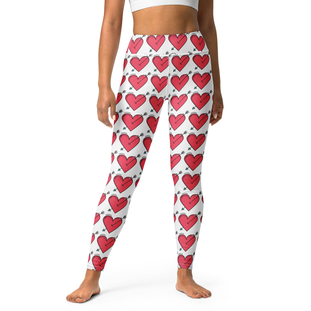 Women’s white buttery soft yoga leggings with vibrant red heart and black arrow pattern quick drying high waisted comfort