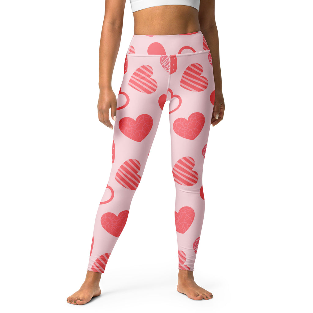 Women’s pink heart pattern buttery soft high waisted yoga leggings made of quick drying stretchy fabric
