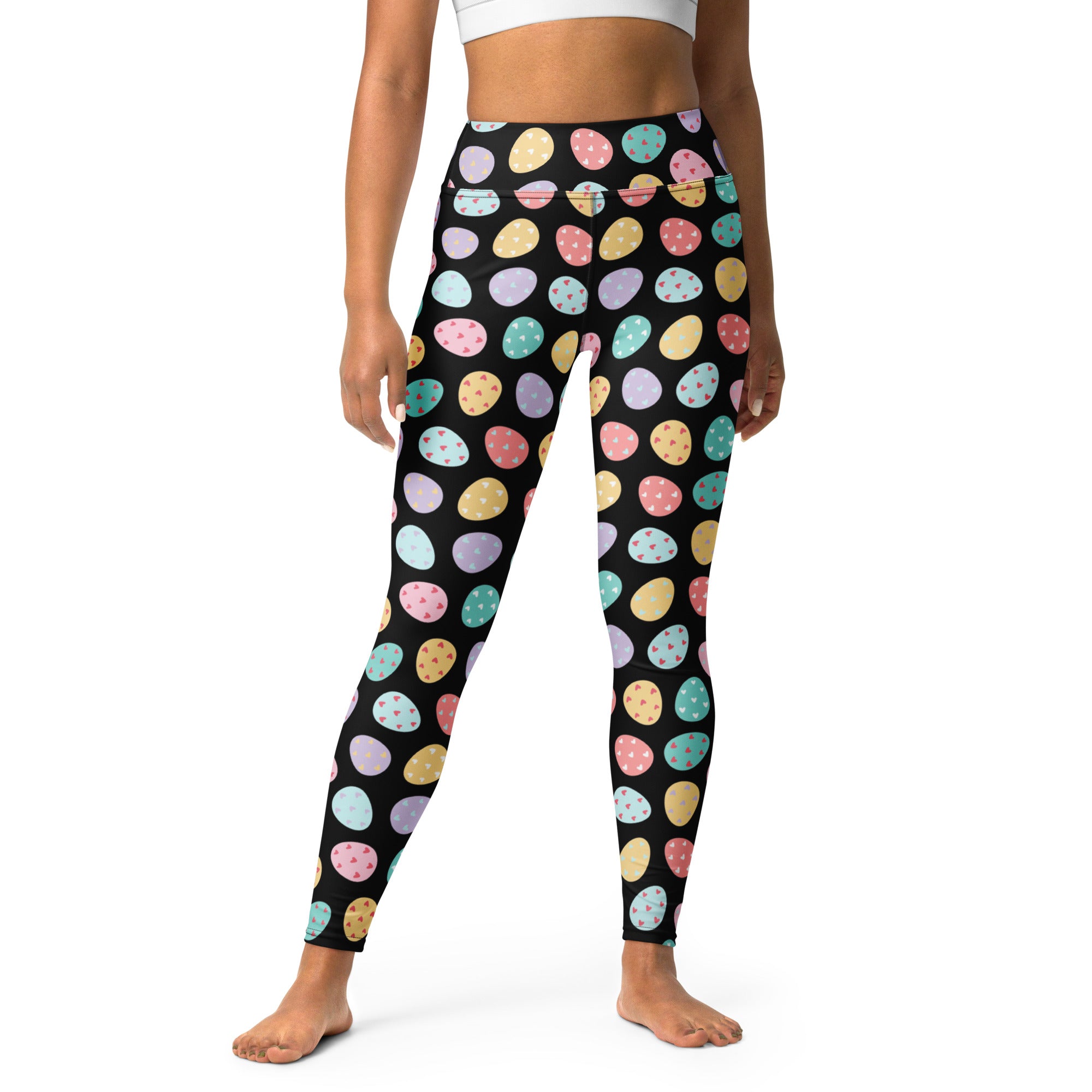 Black women’s high waisted buttery soft yoga leggings with pastel colorful easter eggs pattern and quick drying fabric