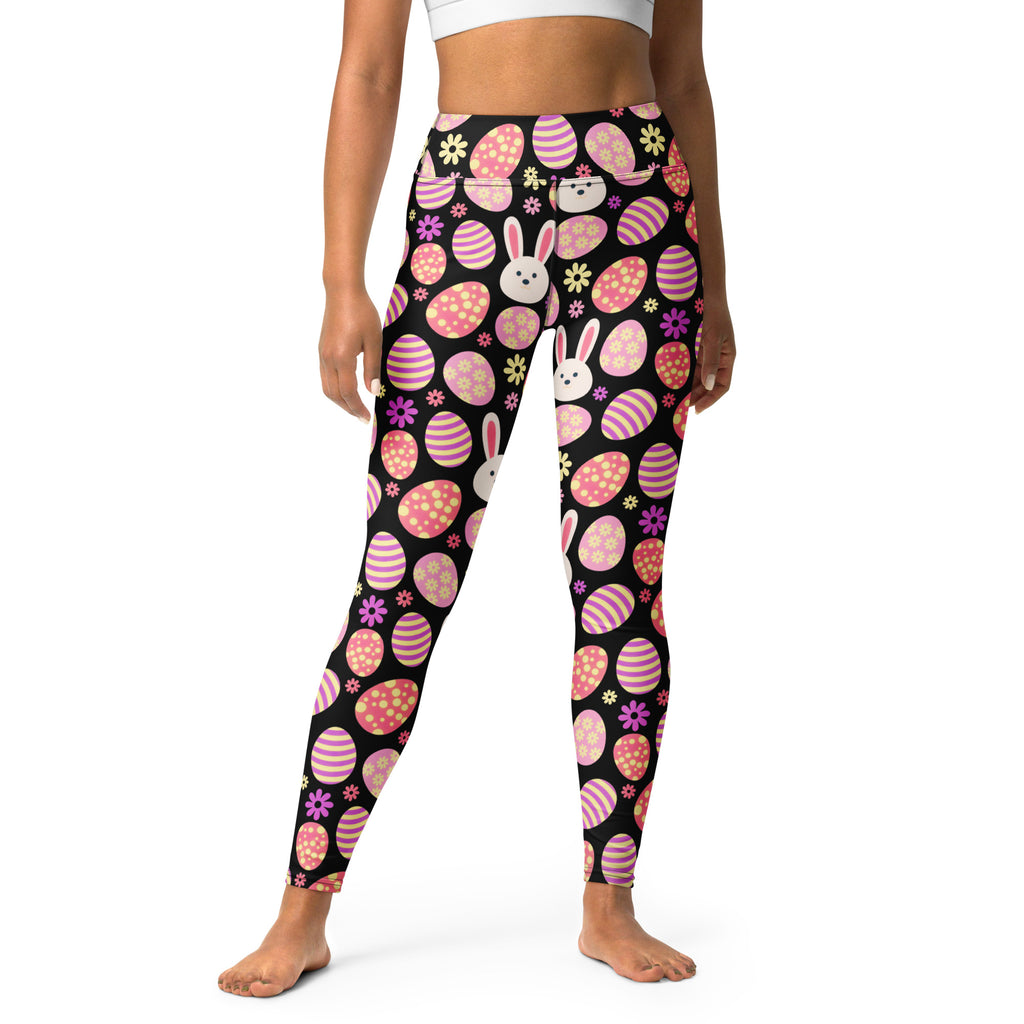 Black buttery soft high waisted women’s yoga leggings with pink purple striped easter eggs white bunny faces and flowers