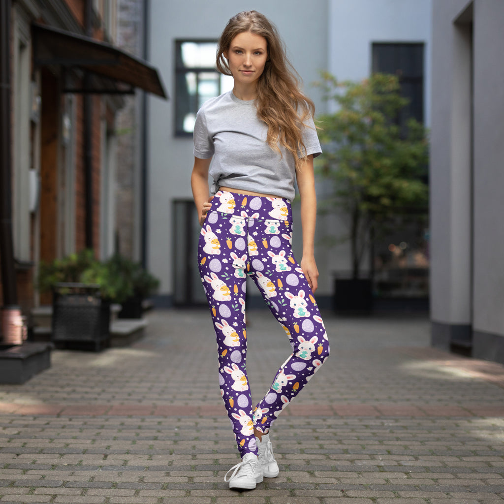 Women’s purple buttery soft high waisted yoga leggings with white bunnies pastel eggs and carrots quick drying