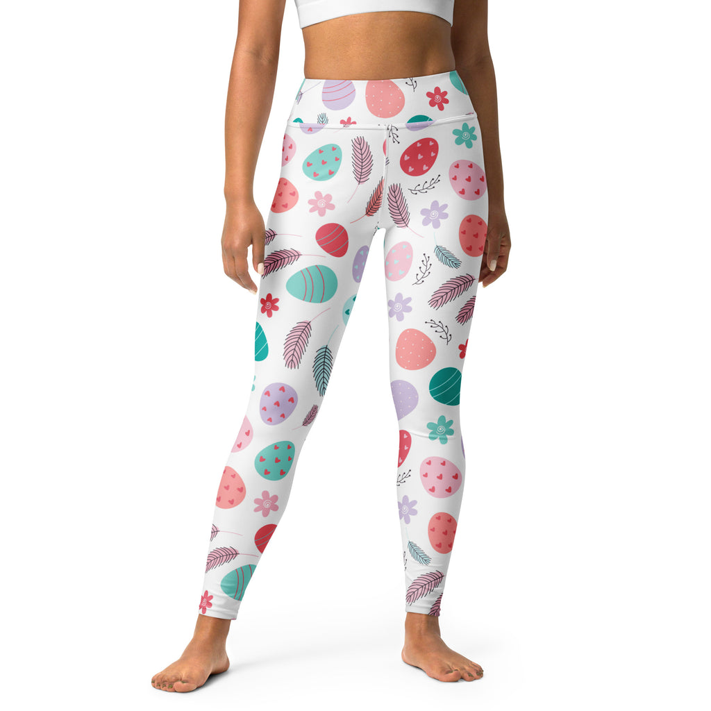 White leggings with pastel easter egg floral pattern in pink teal purple and green buttery soft high waisted design