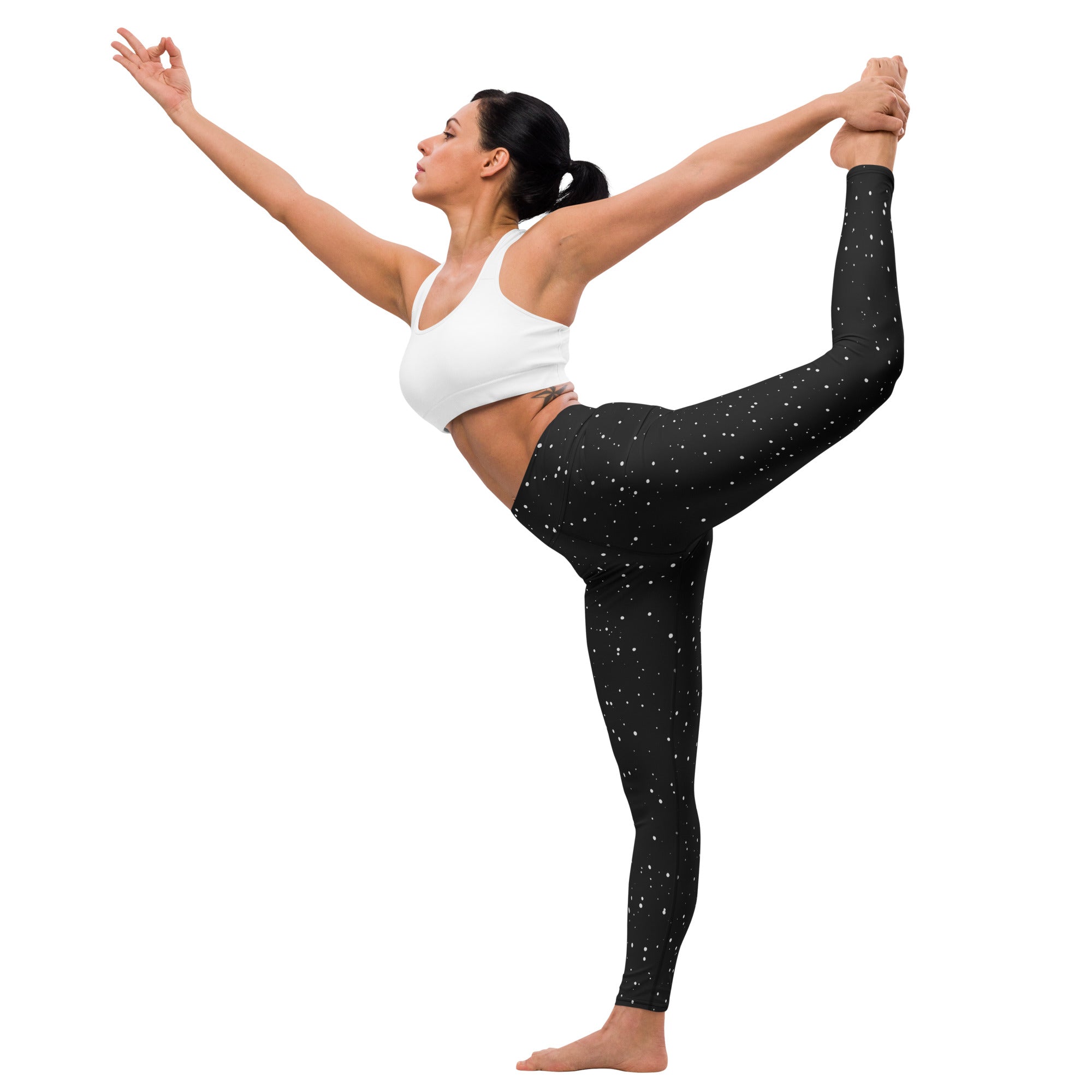 Women’s black buttery soft yoga leggings with subtle white snowflake pattern on front side