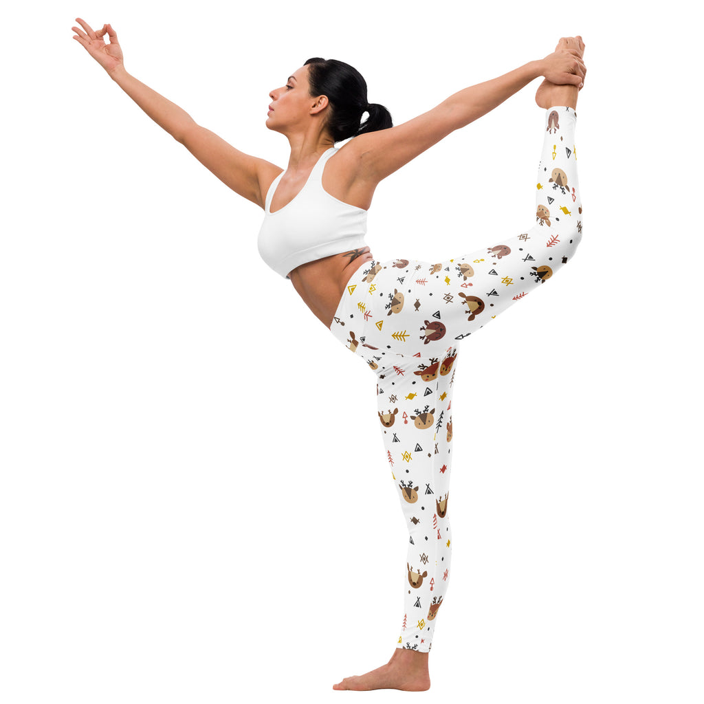 White buttery soft women’s yoga leggings with playful brown deer reindeer print and earthy geometric shapes and arrows