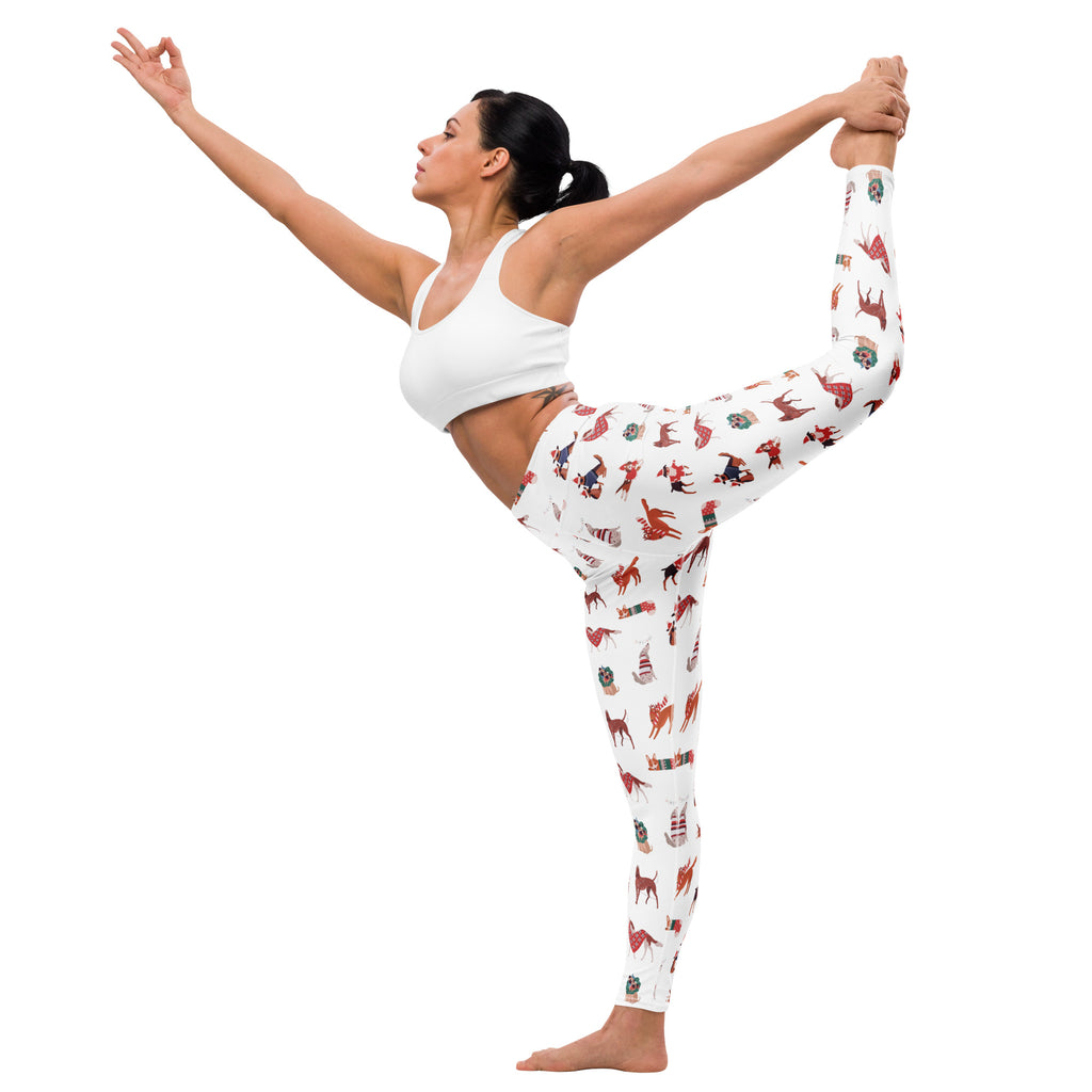 Women’s white buttery soft yoga leggings with playful red and brown deer hats and whimsical christmas designs