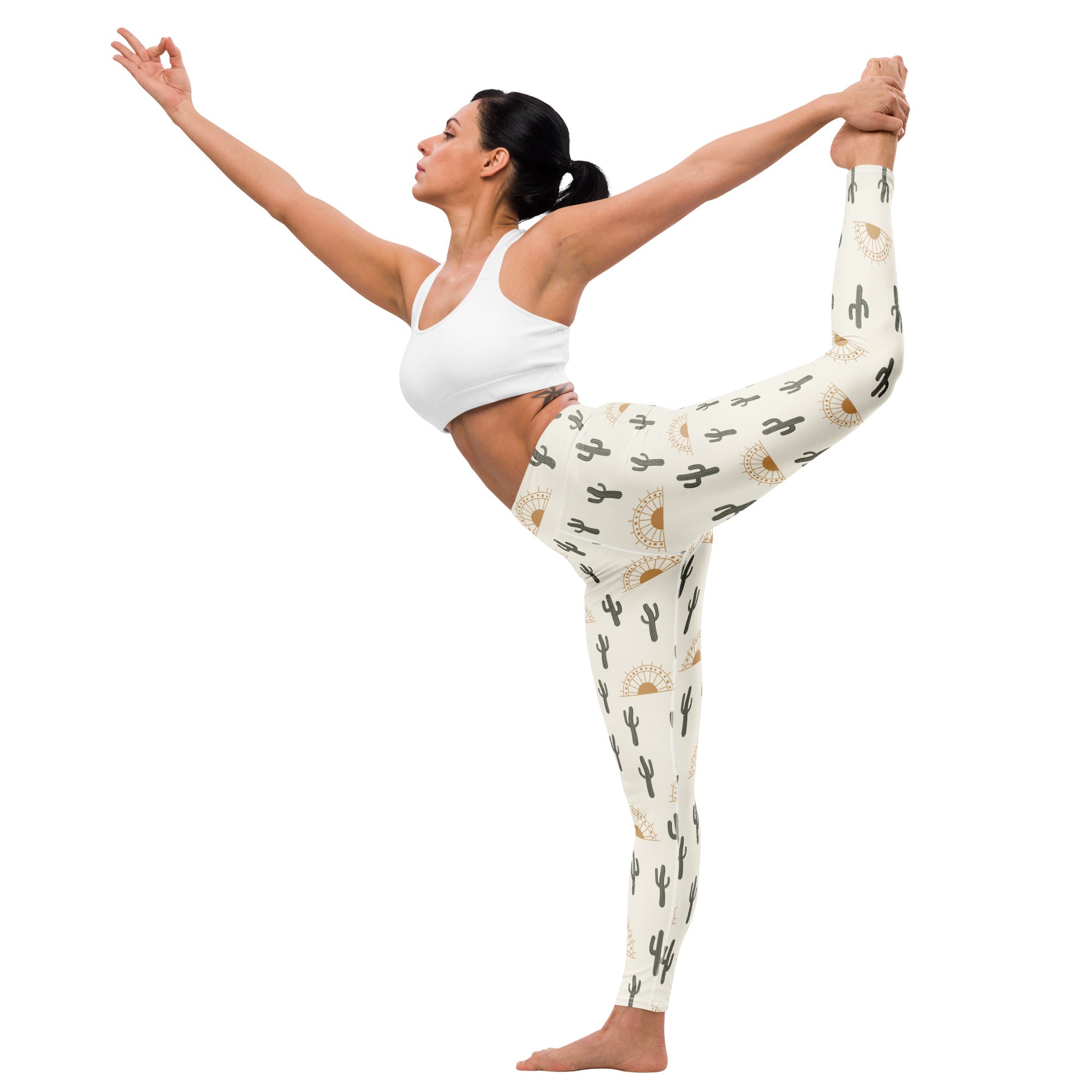 Cream-colored buttery soft women’s yoga leggings with black cactus and gold sun patterns for desert sunrise vibes