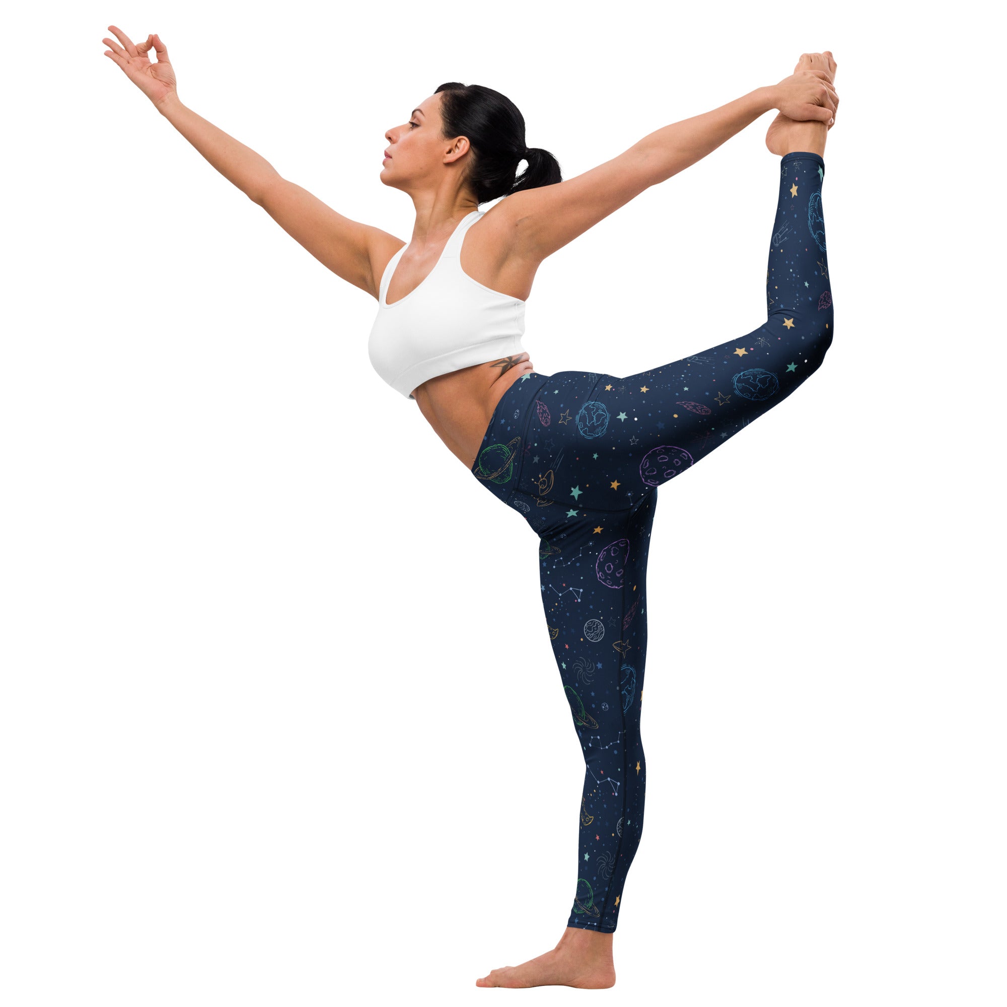 Dark blue women’s buttery soft yoga leggings with colorful celestial pattern of stars moons and constellations