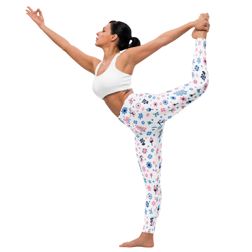 White women’s pastel floral buttery soft yoga leggings with delicate pink and blue floral pattern for comfortable workouts