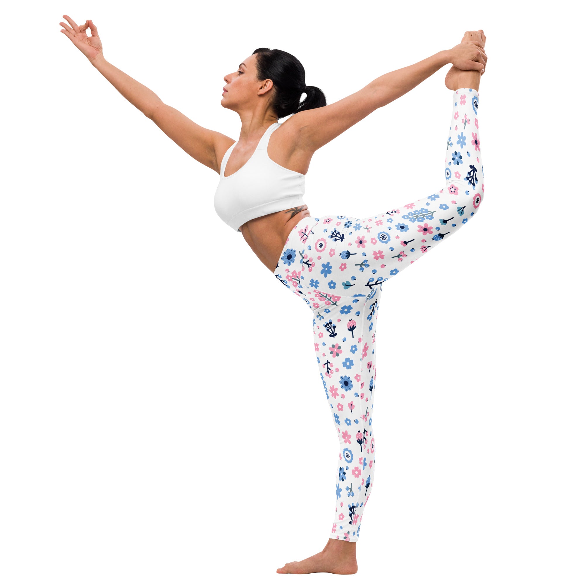 White women’s pastel floral buttery soft yoga leggings with delicate pink and blue floral pattern for comfortable workouts