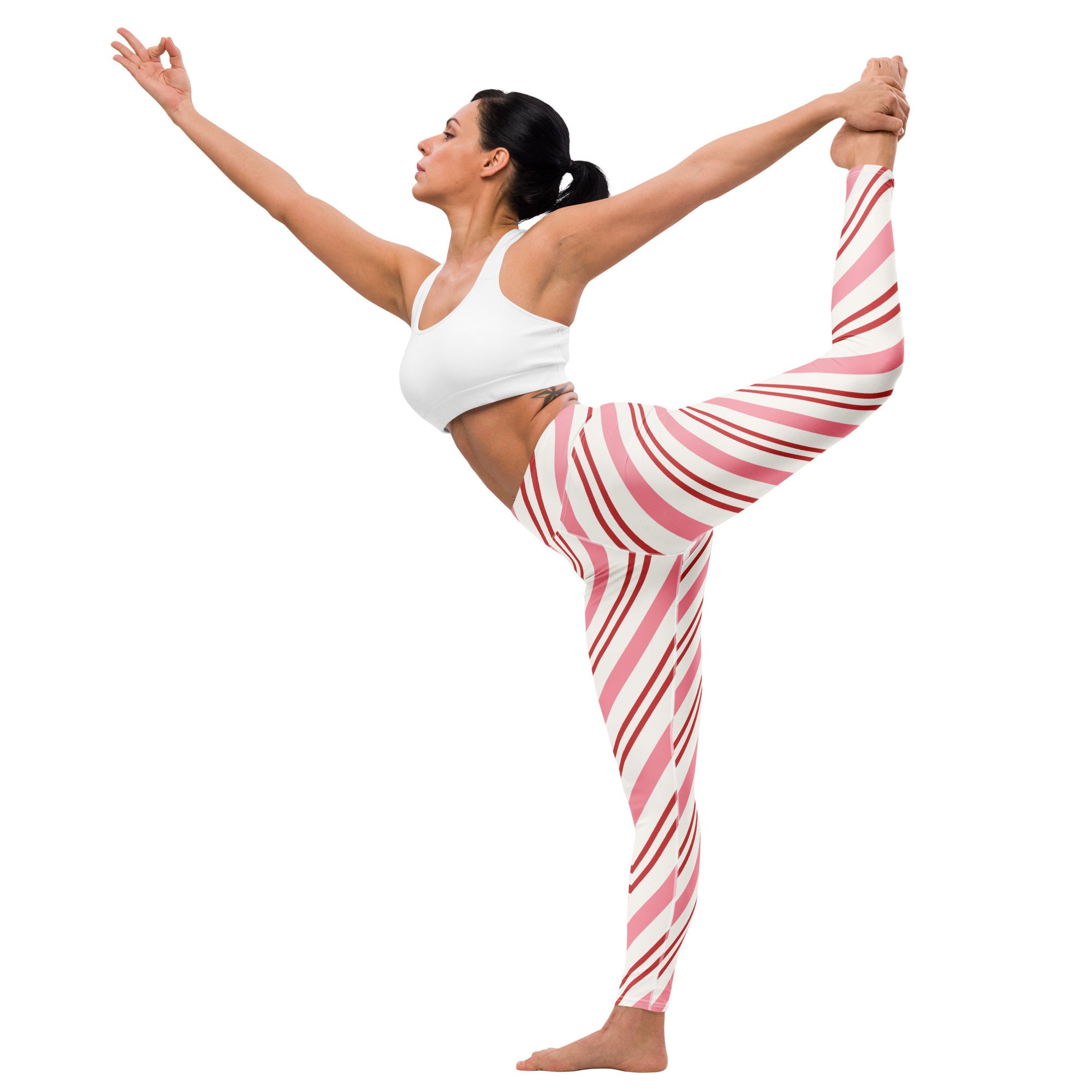 Women’s buttery soft yoga leggings with pink and white candy cane diagonal stripes for comfortable workouts